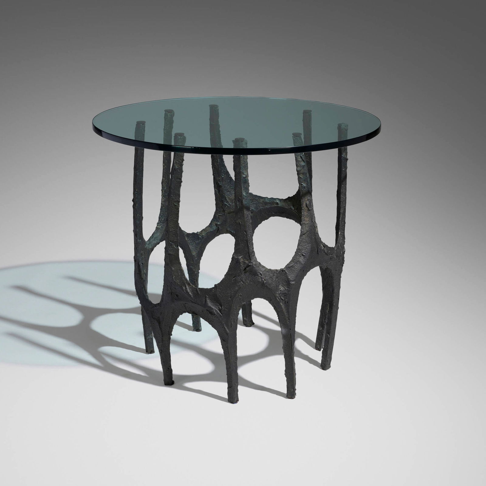 Paul Evans, Custom Sculpted Bronze Stalagmite occasional table: Paul Evans Custom Sculpted Bronze Stalagmite occasional table Paul Evans Studio for DirectionalUSA, c. 1975bronze resin over steel, glass 28.75 h x 32 dia in (73 x 81 cm) Provena