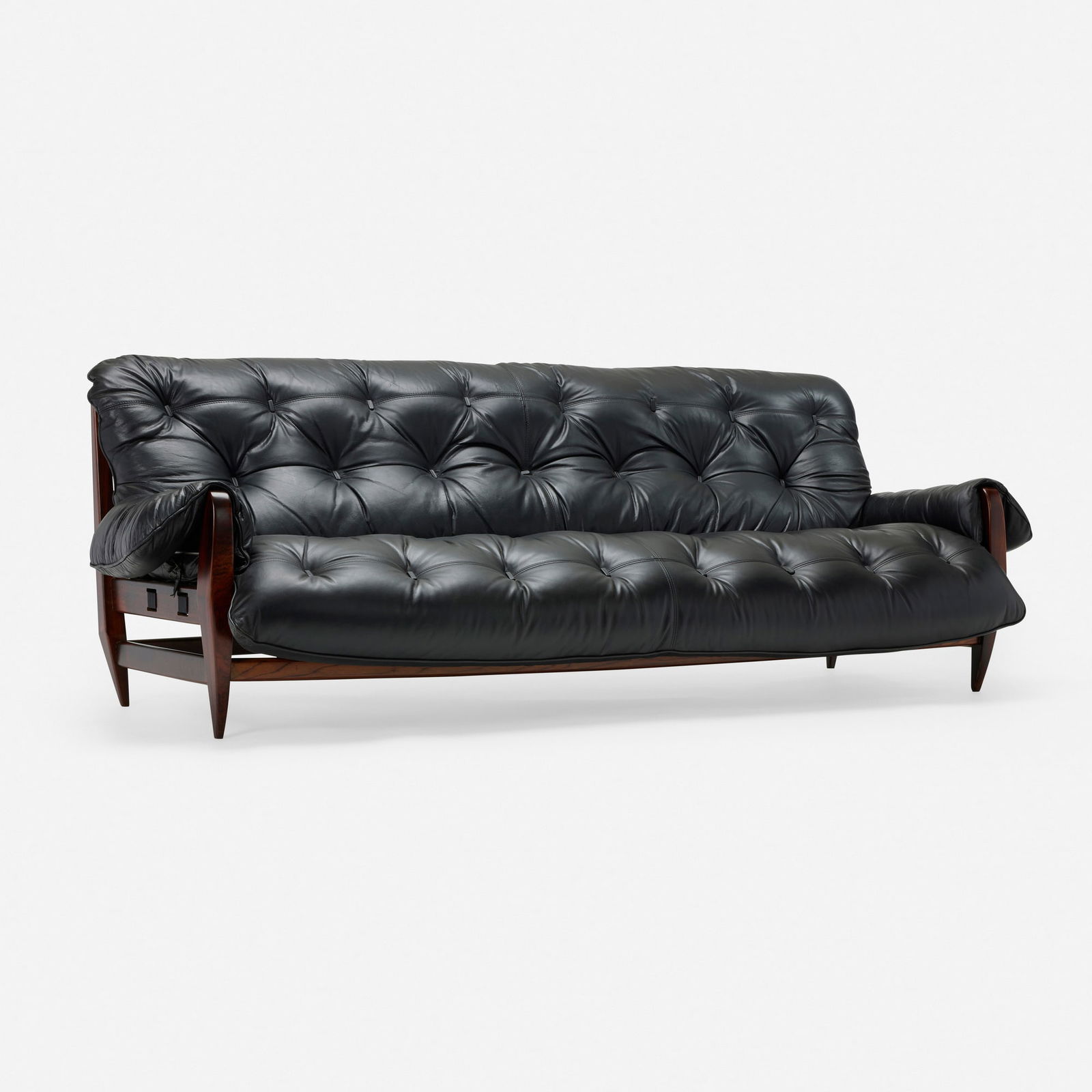 Jean Gillon, Rodeio sofa: Jean Gillon Rodeio sofa Italma Wood ArtBrazil, c. 1965jacaranda, leather 30 h x 87.25 w x 36 d in (76 x 222 x 91 cm) This work will ship from Chicago, Illinois.