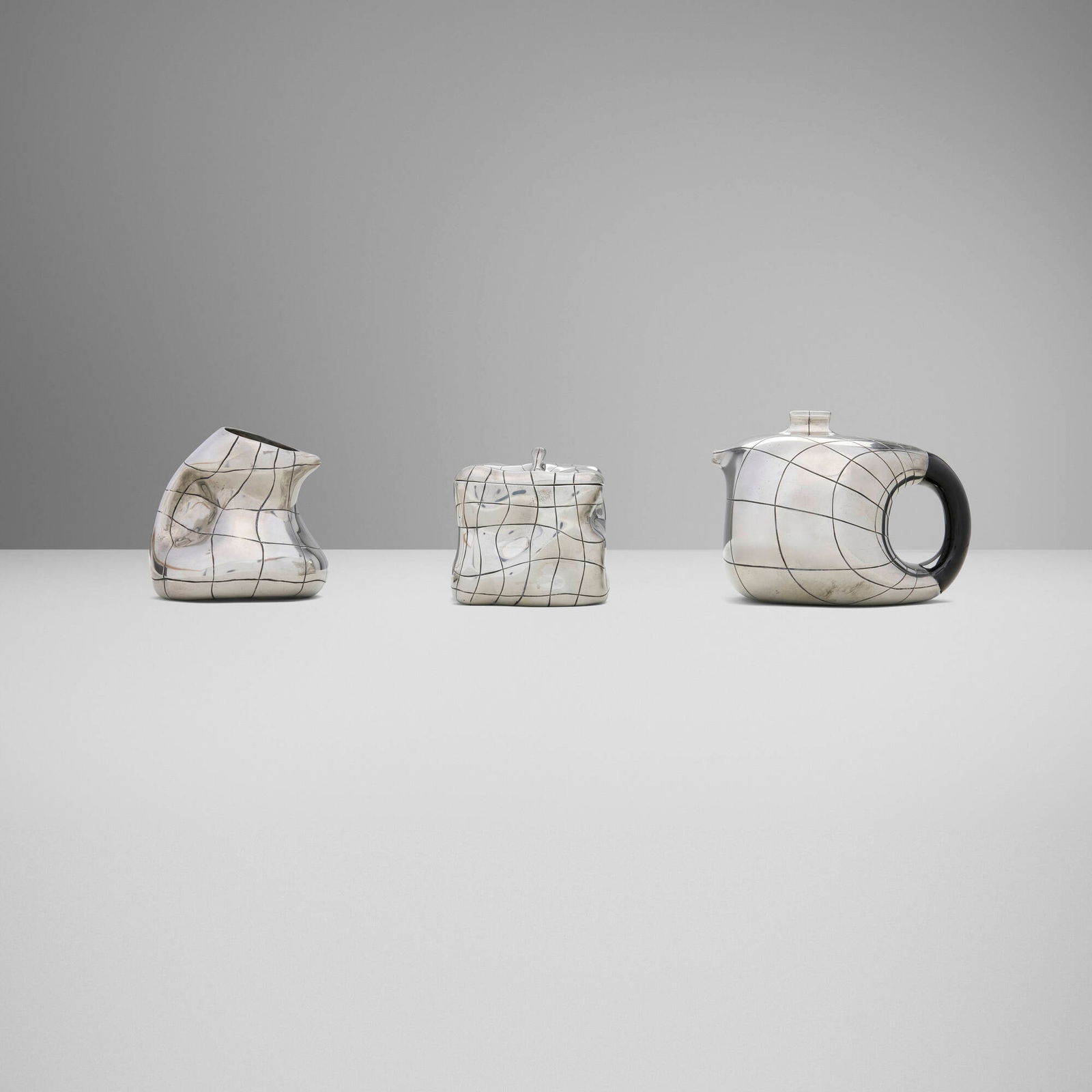 Pascal Morabito, Mutation tea service: Pascal Morabito Mutation tea service France, c. 1970pewter, enamel 4.25 h x 6 w x 5 d in (11 x 15 x 13 cm) 3.25 h x 3.5 w x 3.5 d in (8 x 9 x 9 cm) 4.25 h x 4 w x 3.5 d in (11 x 10 x 9 cm) <