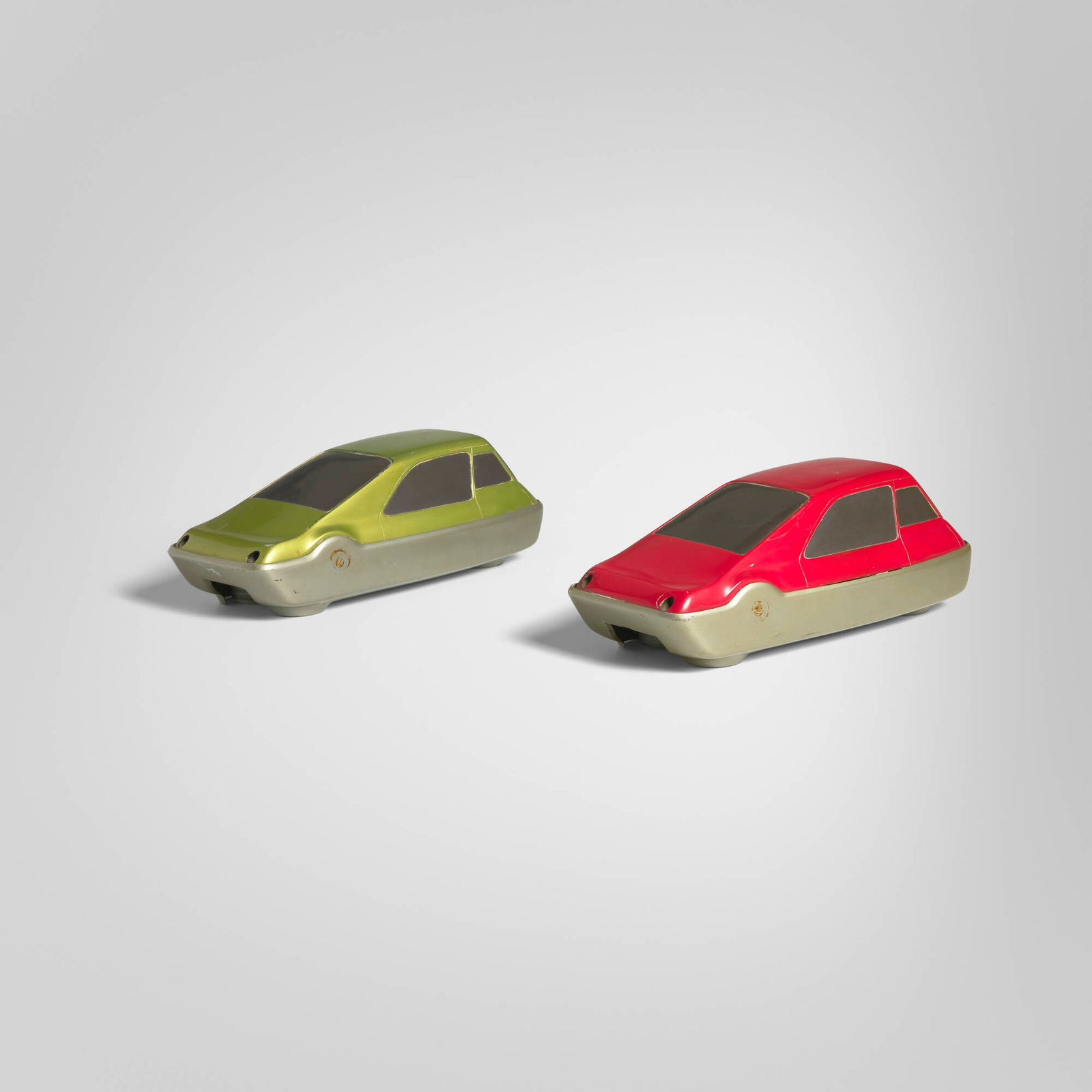 Henry Dreyfuss, attribution, Concept car models, set of two: Henry Dreyfuss, attribution Concept car models, set of two c. 1960painted composite 5.25 h x 15 w x 6 d in (13 x 38 x 15 cm) This work will ship from Chicago, Illinois.