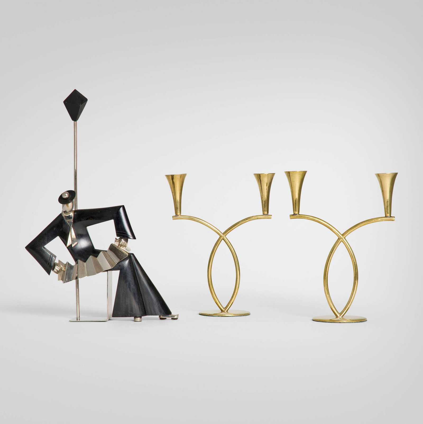 Richard Rohac and Sier Kunst, Candleabra, pair and Seated Figure (Sculpture): Richard Rohac and Sier Kunst Candleabra, pair and Seated Figure (Sculpture) Austria, c. 1930nickel-plated brass, carved wood, brass figure: 13.5 h x 9 w x 2.75 d in (34 x 23 x 7 cm) candleholder: