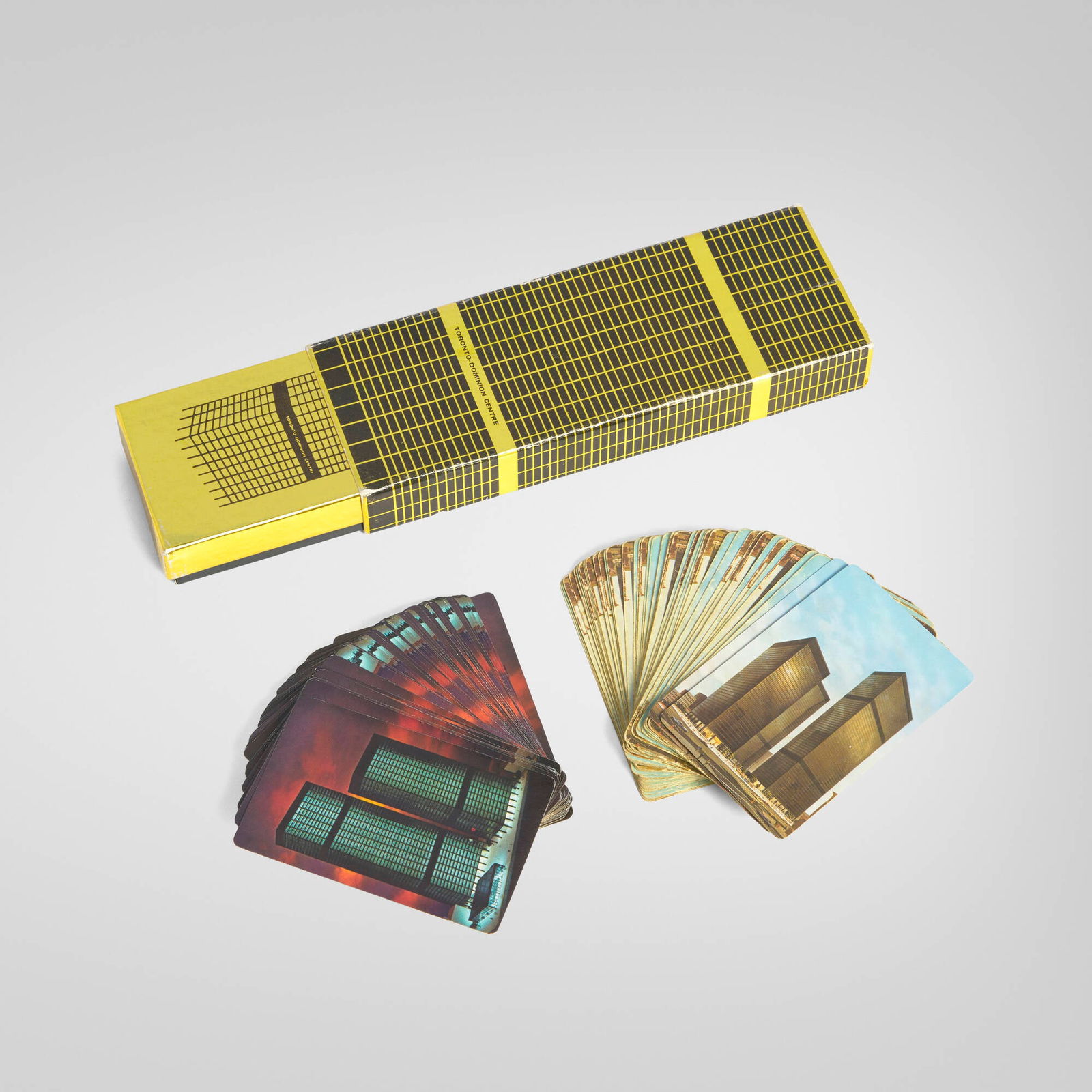 Playing cards from the Toronto-Dominion Centre (TD Centre): Playing cards from the Toronto-Dominion Centre (TD Centre) c. 1974printed paper 1 h x 7.25 w x 2.5 d in (3 x 18 x 6 cm) Lot is comprised of two decks of cards. Provenance: Toronto-Dominion