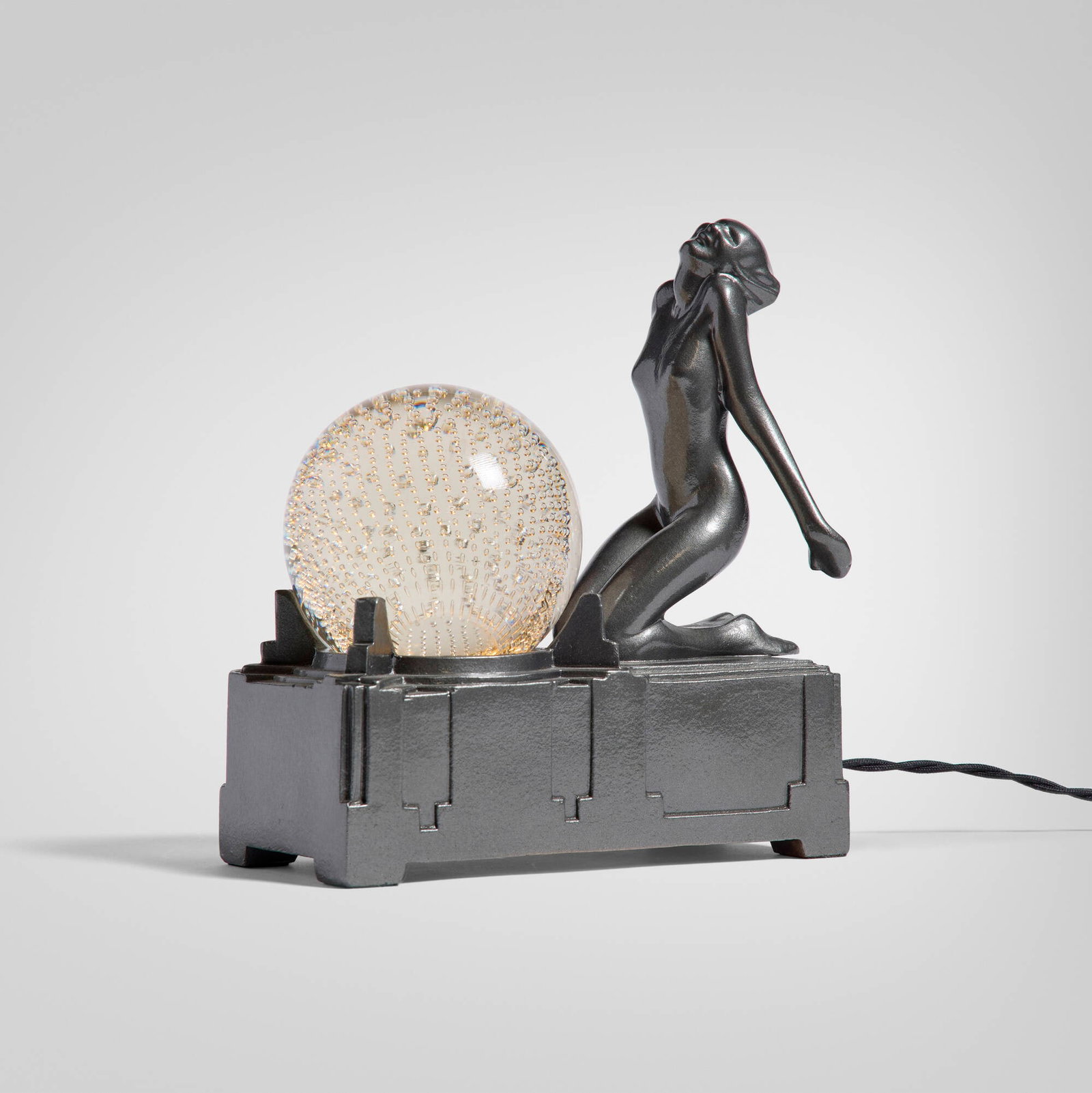 Frankart, Inc., Figural table lamp: Frankart, Inc. Figural table lamp USA, c. 1930cast and enameled aluminum, glass 8.5 h x 8.25 w x 3.75 d in (22 x 21 x 10 cm) Molded manufacturer's mark to base 'Frankart Inc. Pat. Appld For.'.