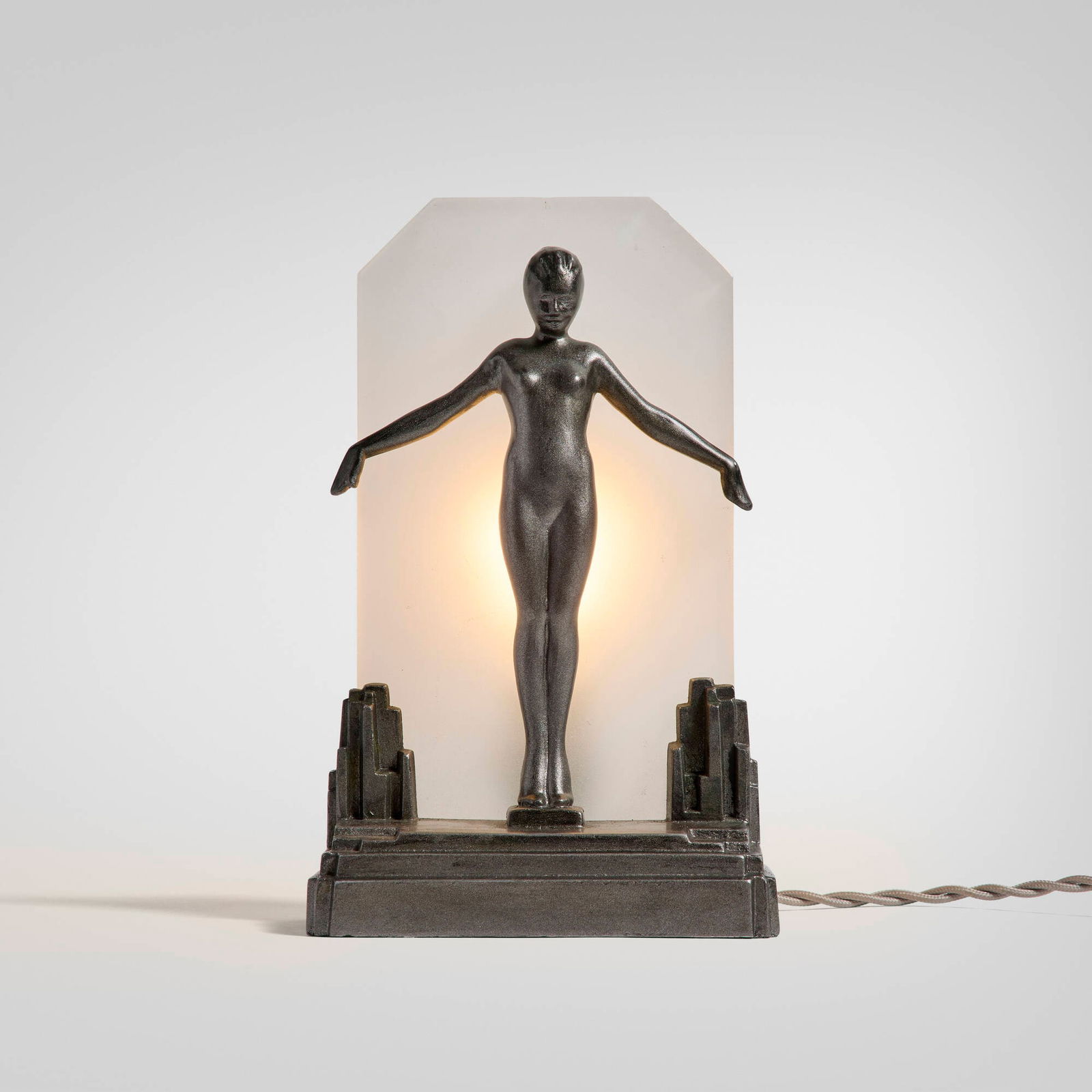 Frankart, Inc., Figural table lamp: Frankart, Inc. Figural table lamp USA, 1928frosted glass, cast and enameled aluminum 10.25 h x 6.5 w x 4 d in (26 x 17 x 10 cm) Molded manufacturer's mark to lower edge '(c) 1928 Frankart Pat.