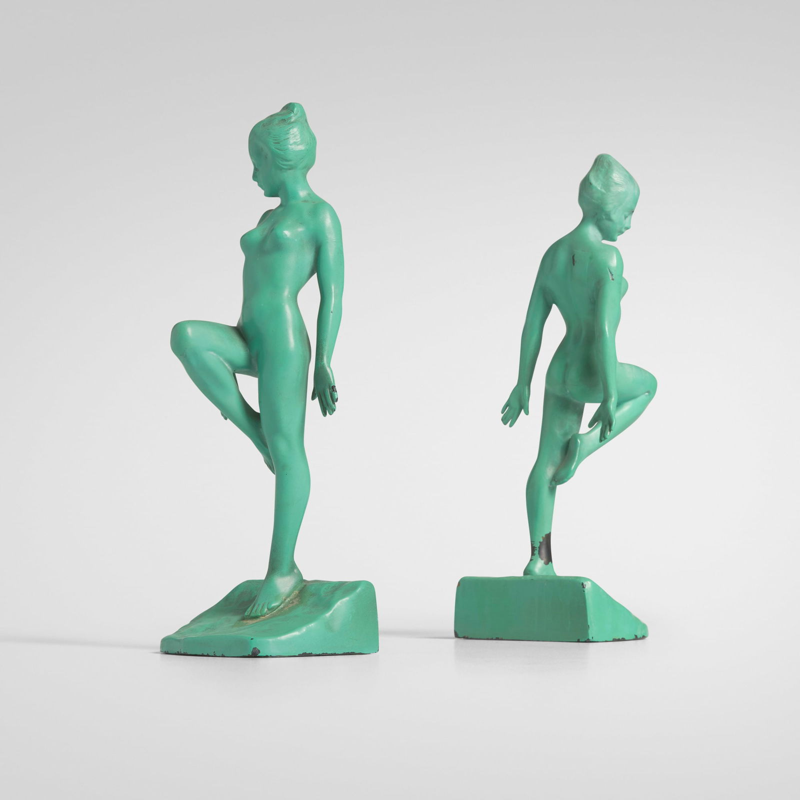 Frankart, Inc., Figural bookends, pair: Frankart, Inc. Figural bookends, pair USA, c. 1930enameled metal 10.875 h x 4 w x 3.5 d in (28 x 10 x 9 cm) This work will ship from Chicago, Illinois.