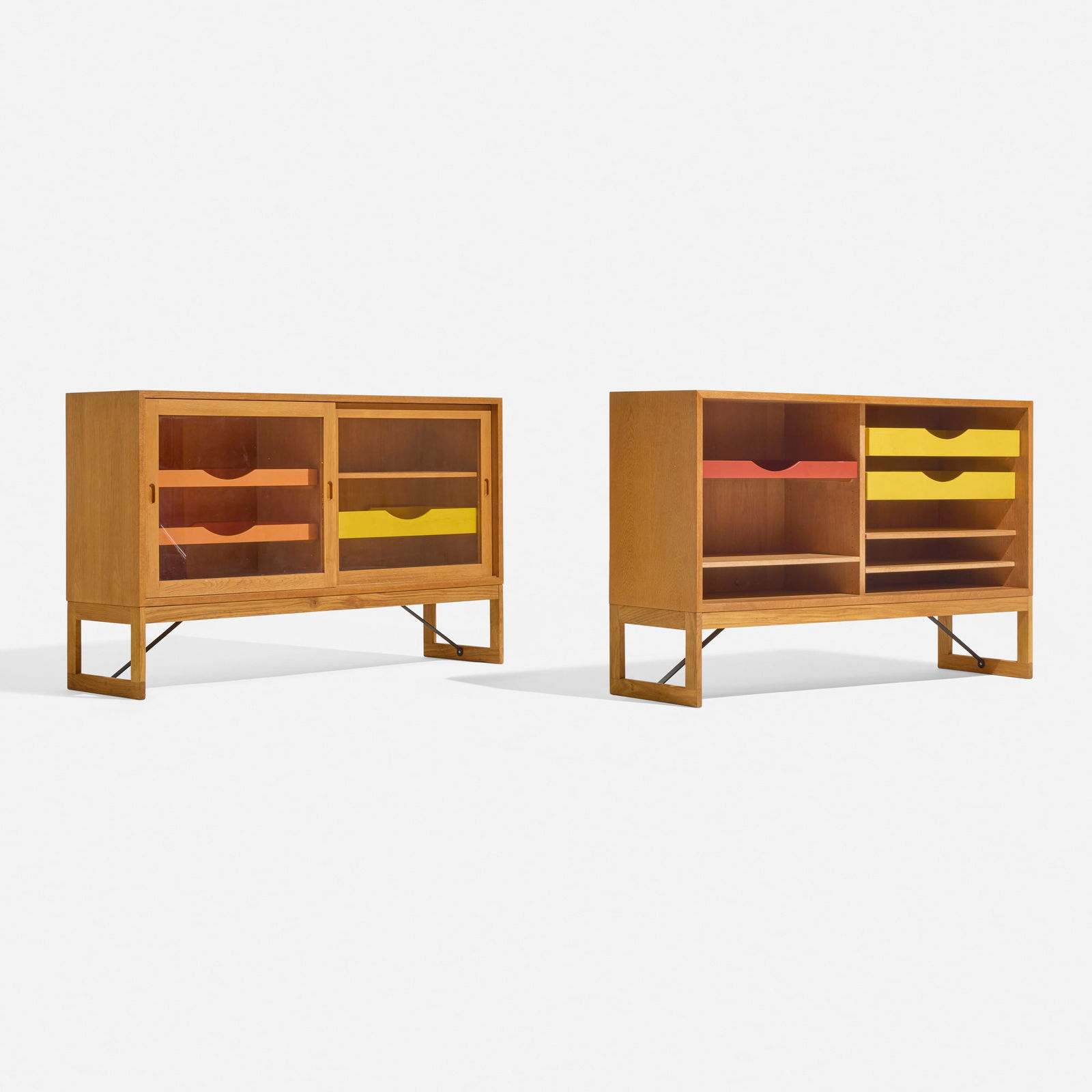 Borge Mogensen, Cabinets, set of two: Borge Mogensen Cabinets, set of two Karl Andersson & Soner / Chr. Larsen & SonDenmark, c. 1955oak, glass, lacquered wood, enameled steel 33 h x 53 w x 14 d in (84 x 135 x 36 cm) One cabi