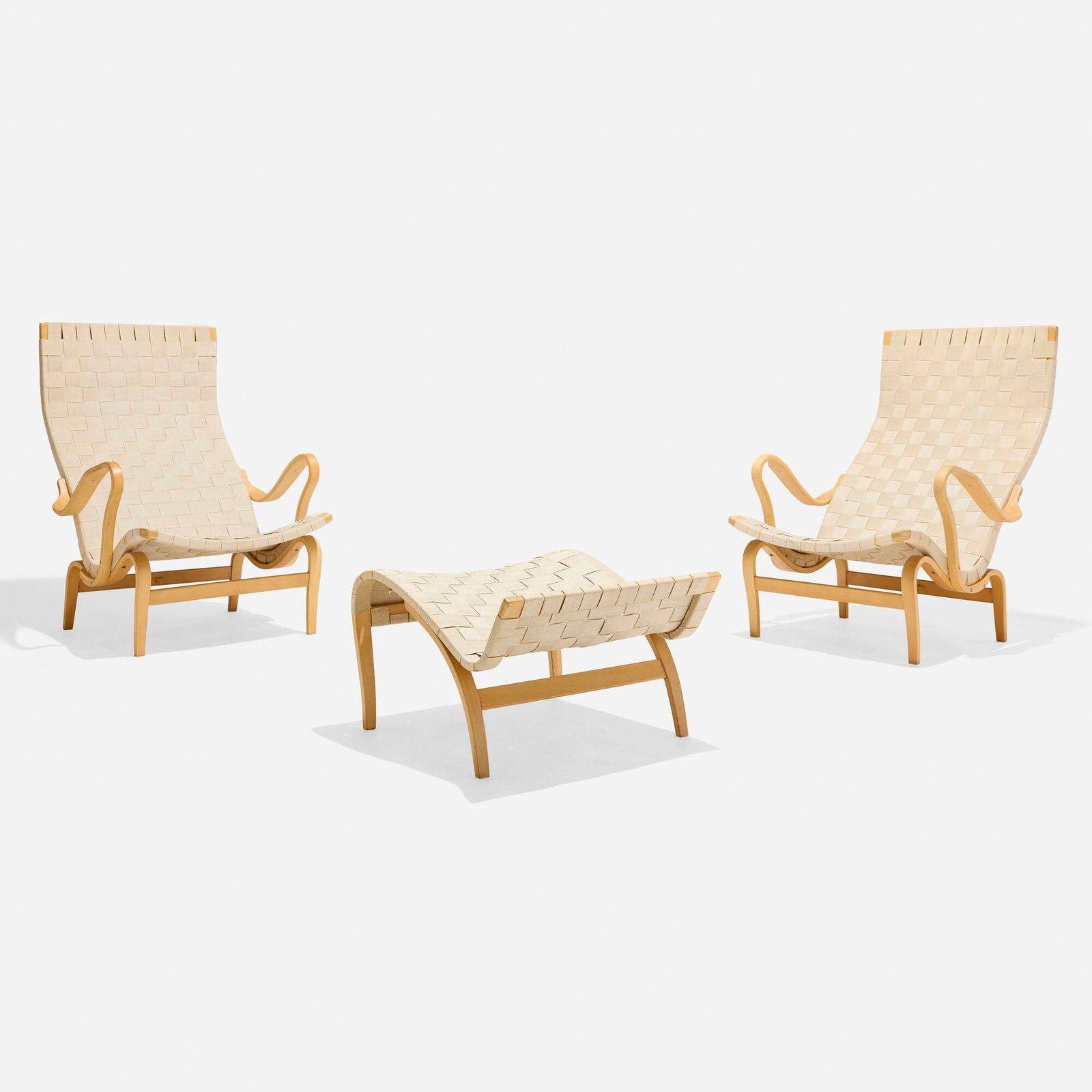 Bruno Mathsson, Pernilla 69 lounge chairs, pair and ottoman: Bruno Mathsson Pernilla 69 lounge chairs, pair and ottoman DUXSweden, 1969 / c. 1970laminated and steam-bent beech, canvas webbing chair: 38.5 h x 29.5 w x 35 d in (98 x 75 x 89 cm) ottoman:
