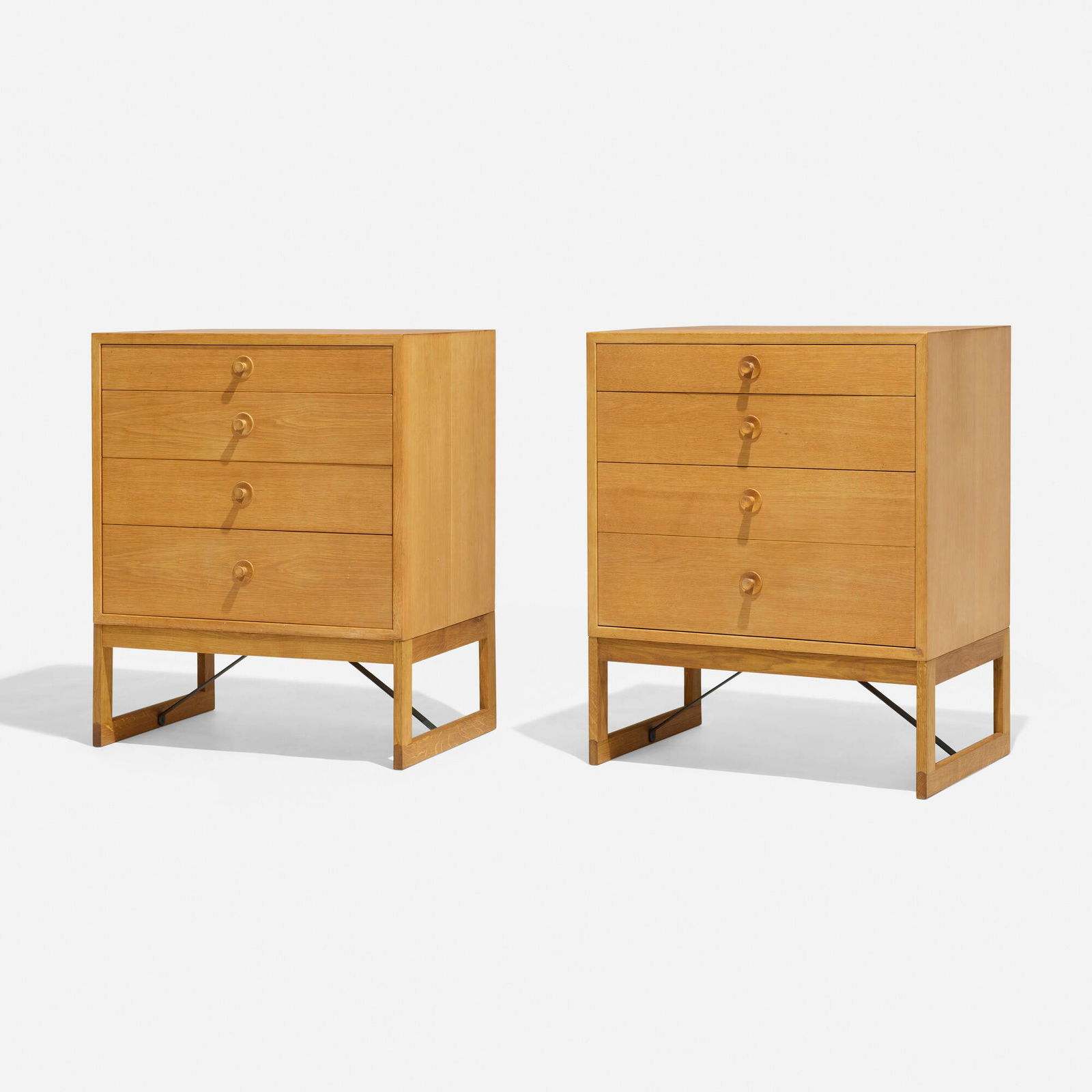 Borge Mogensen, Cabinets, pair: Borge Mogensen Cabinets, pair Karl Andersson & SonerDenmark / Sweden, c. 1955oak, lacquered steel 33 h x 27 w x 18 d in (84 x 69 x 46 cm) Cabinets each feature four drawers. Decal manufa