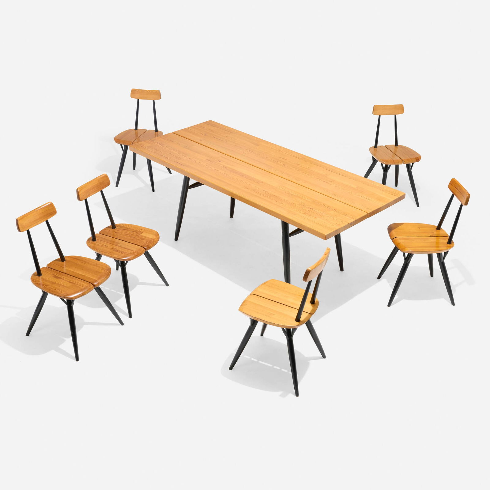 Ilmari Tapiovaara, Pirkka dining set: Ilmari Tapiovaara Pirkka dining set Laukaan Puu Ltd.Finland, 1955-56pine, lacquered wood 26.5 h x 70.75 w x 30.75 d in (67 x 180 x 78 cm) 29.5 h x 14.75 w x 17 d in (75 x 37 x 43 cm)