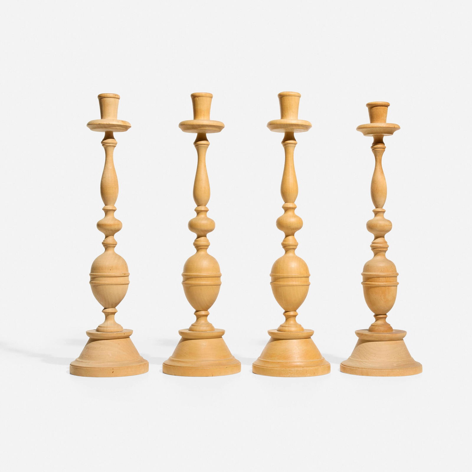Kalevala Koru, Candlesticks, set of four: Kalevala Koru Candlesticks, set of four Finland, c. 1945turned wood 14.75 h x 4.25 dia in (37 x 11 cm) Impressed manufacturer's mark to underside of each example 'KK'. This