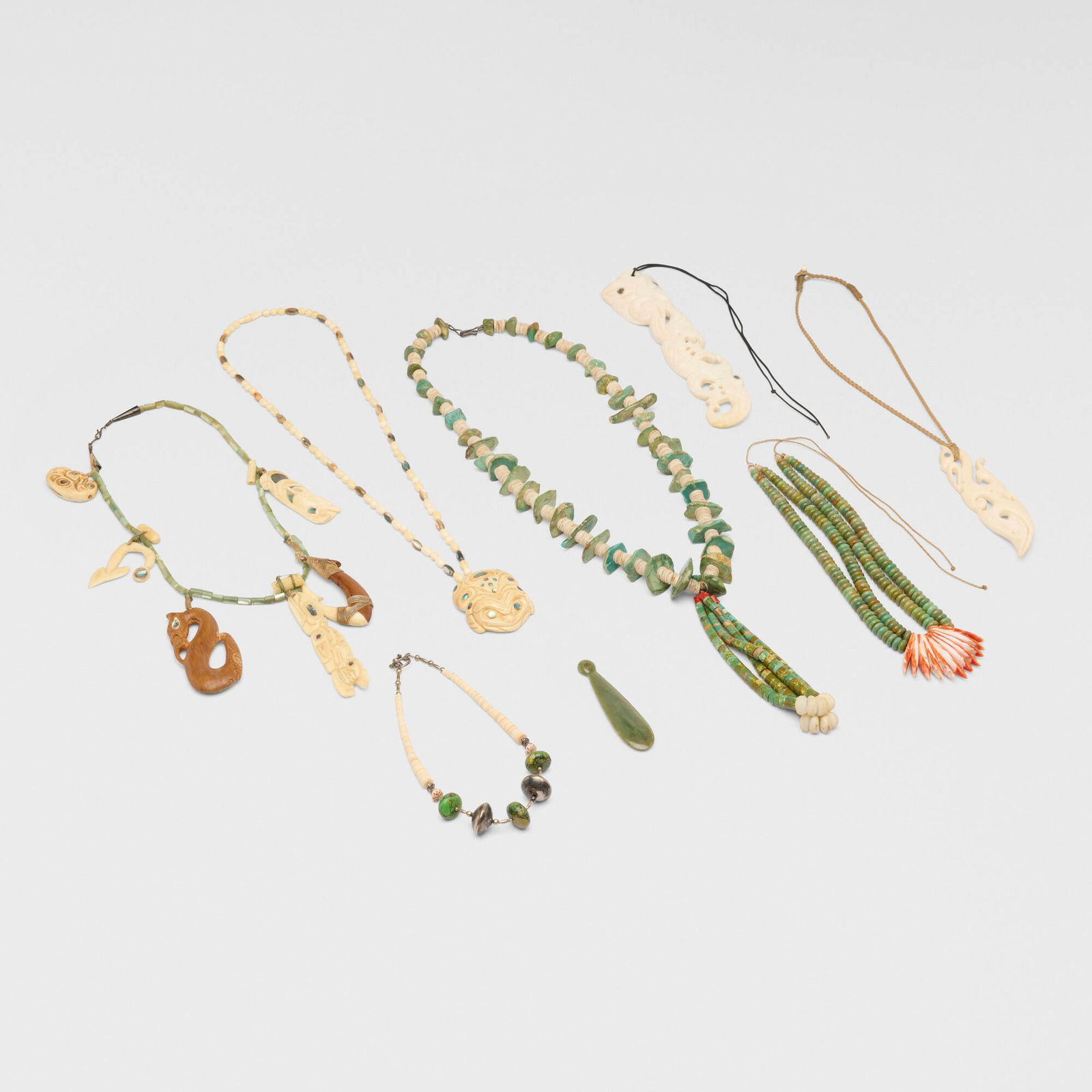 Pacific Islander, Collection of necklaces and pendant: Pacific Islander Collection of necklaces and pendant turquoise, bone, shell, wood, abalone shell, coral, mother of pearl, base metal, nephrite jade longest necklace: 20.5 h x 2 w x 1 d in (52 x 5 x 3