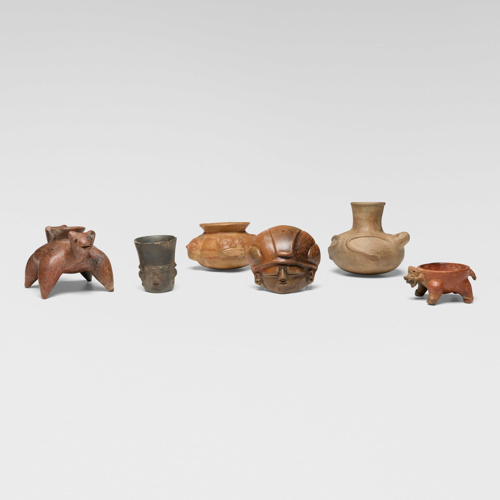Collection of six Pre-Columbian-style objects (1 of 6)