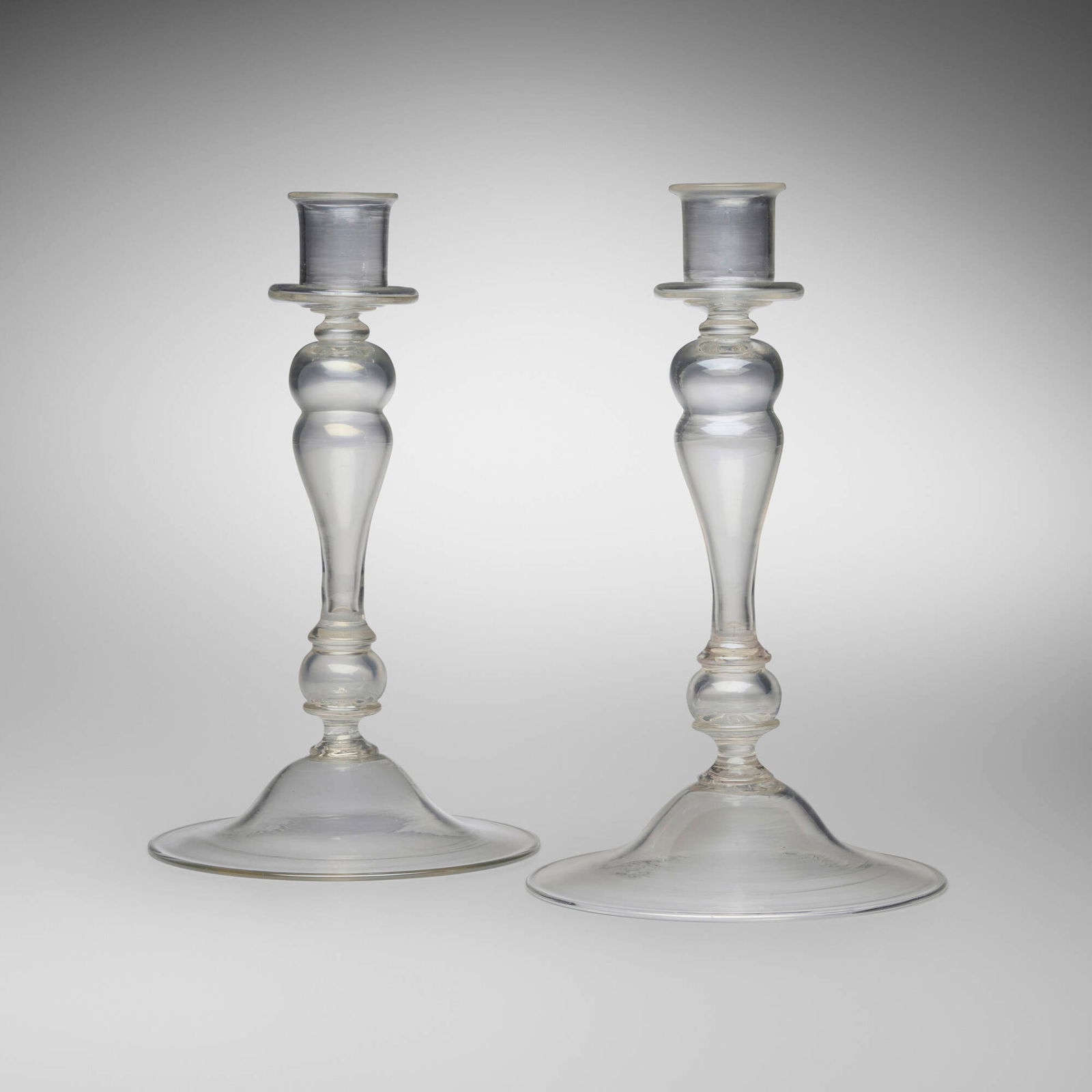 Vittorio Zecchin, Soffiato candlesticks, pair: Vittorio Zecchin Soffiato candlesticks, pair MVM CappellinItaly, c. 1925soffiato glass 10.875 h x 6.375 dia in (28 x 16 cm) Signed with three-lined acid stamp to underside 'MVM Cappellin
