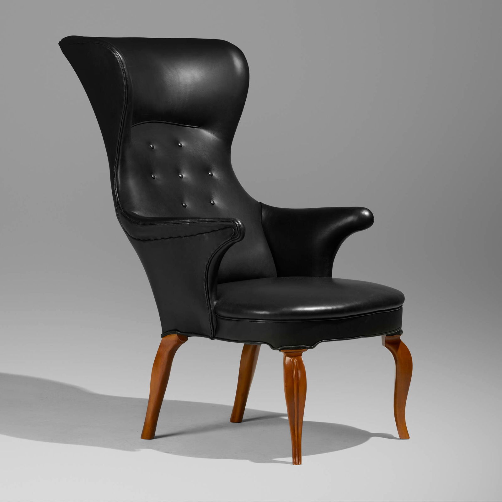 Frits Henningsen, Wingback chair: Frits Henningsen Wingback chair Denmark, 1935leather upholstery, maple 45 h x 27.25 w x 36.75 d in (114 x 69 x 93 cm) Provenance: Private Collection Literature: