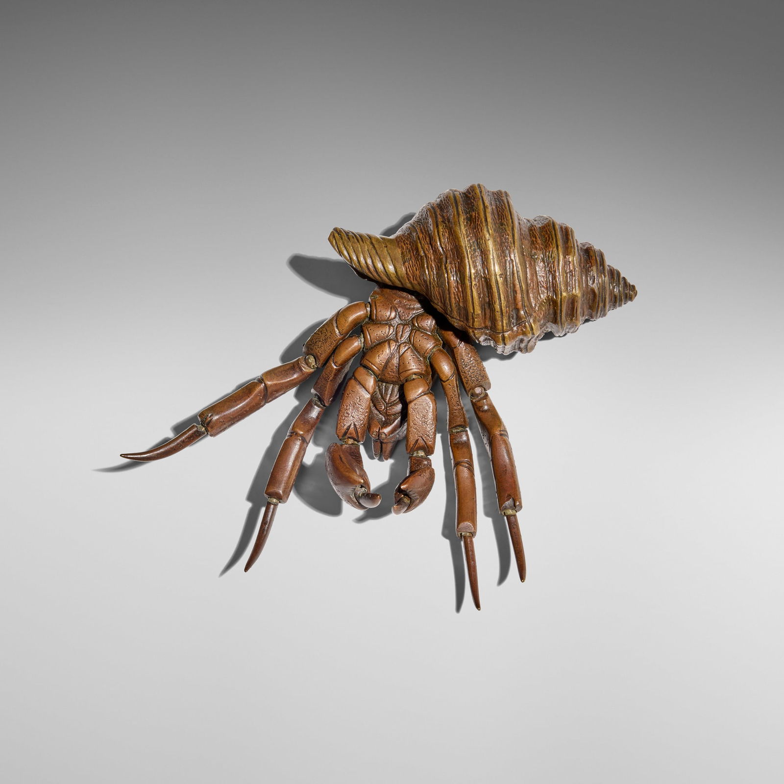 Japanese, Articulated okimono of a hermit crab: Japanese Articulated okimono of a hermit crab Edo periodbronze 1.75 h x 5 w x 4.875 d in (4 x 13 x 12 cm) This work will ship from Los Angeles, California.
