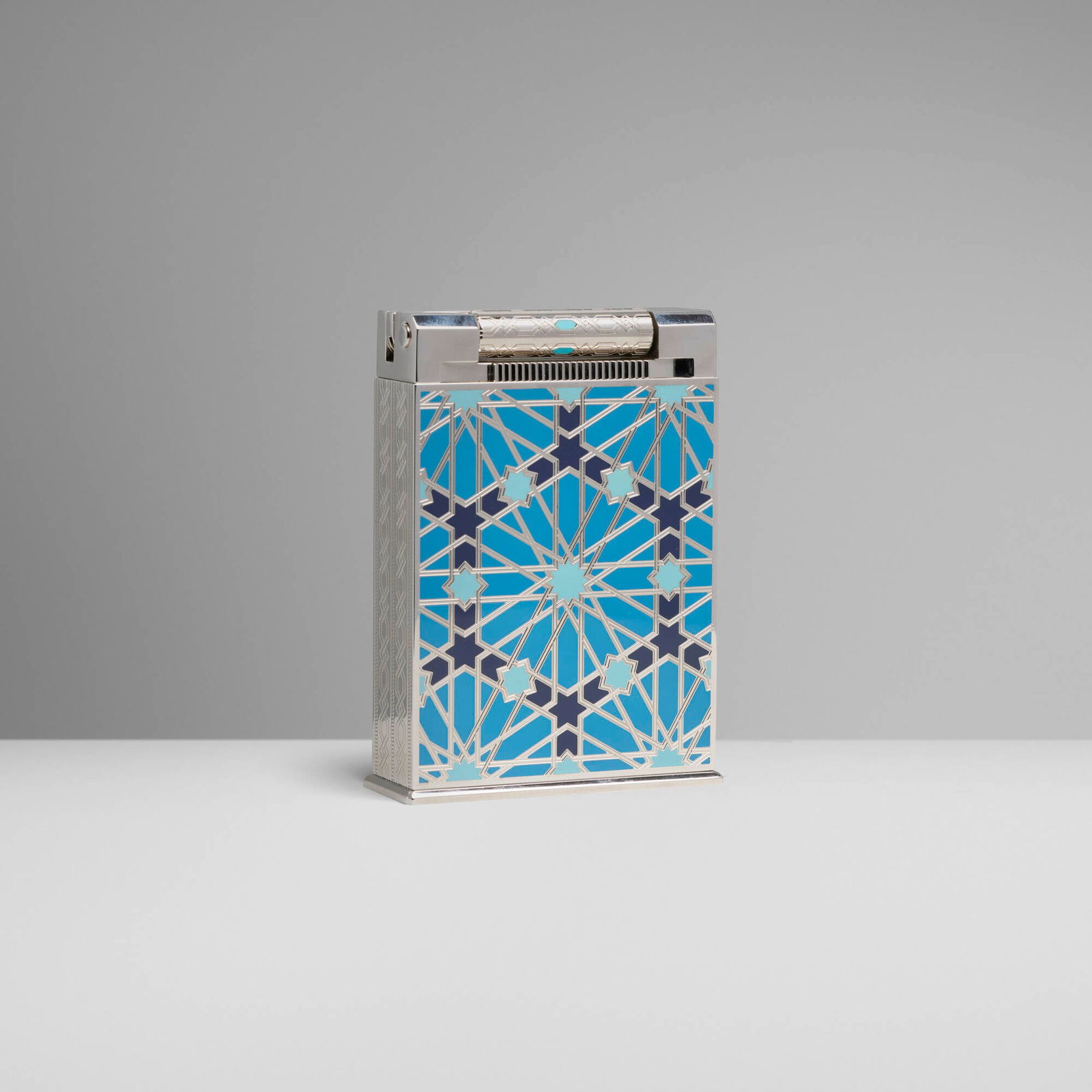 S.T. Dupont, Andalusia jeroboam table lighter: S.T. Dupont Andalusia jeroboam table lighter France, 2003lacquer, palladium-plated metal, turquoise 4 h x 2.875 w x 1 d in (10 x 7 x 3 cm) Impressed manufacturer's mark and number '123/300 S.T