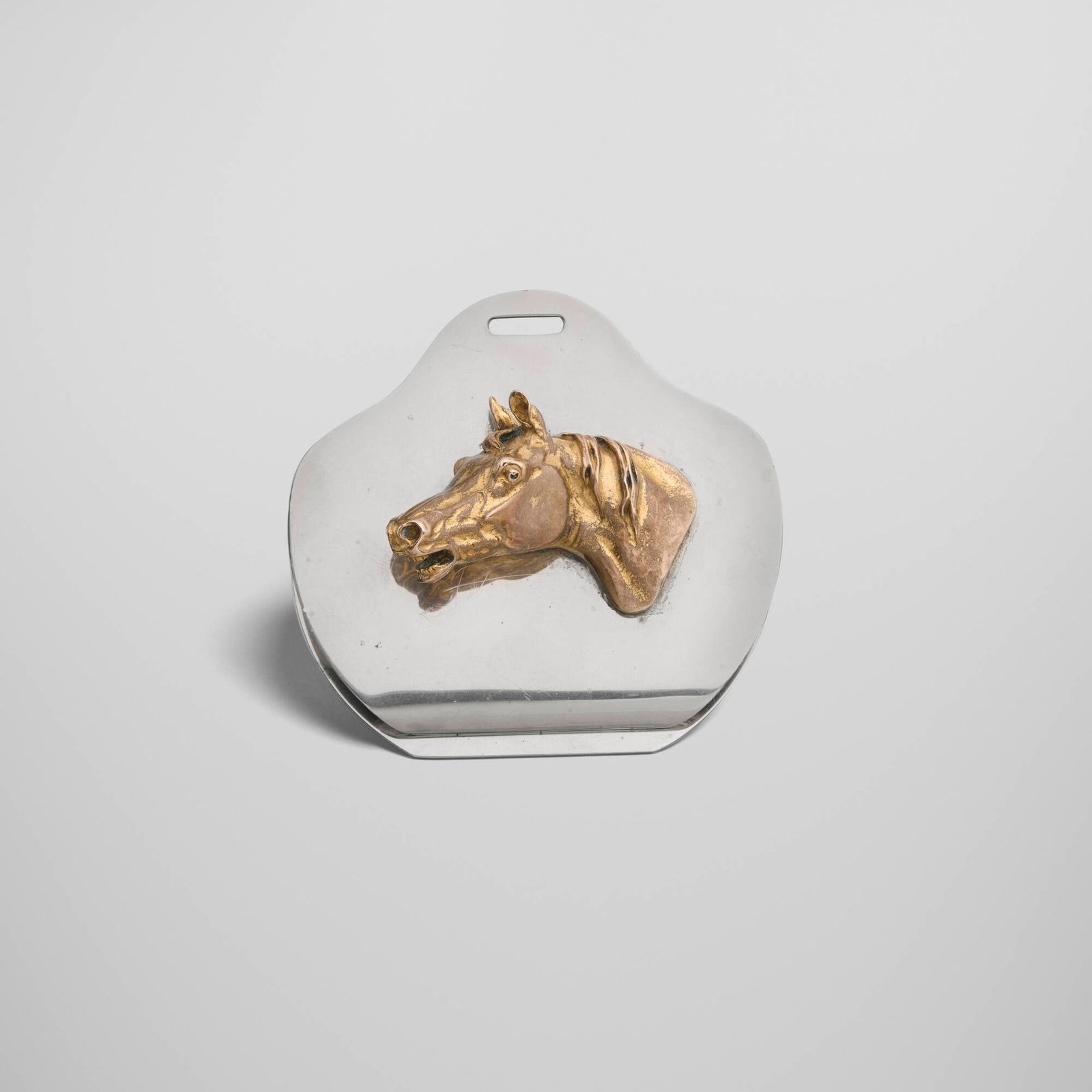 Hermes, Horse Head paper clip: Hermes Horse Head paper clip Ravinet d'Enfert & CieFrance, c. 1965silver-plated metal, bronze 1 h x 4 w x 0.5 d in (3 x 10 x 1 cm) Impressed manufacturer's mark to underside 'Hermes Pari