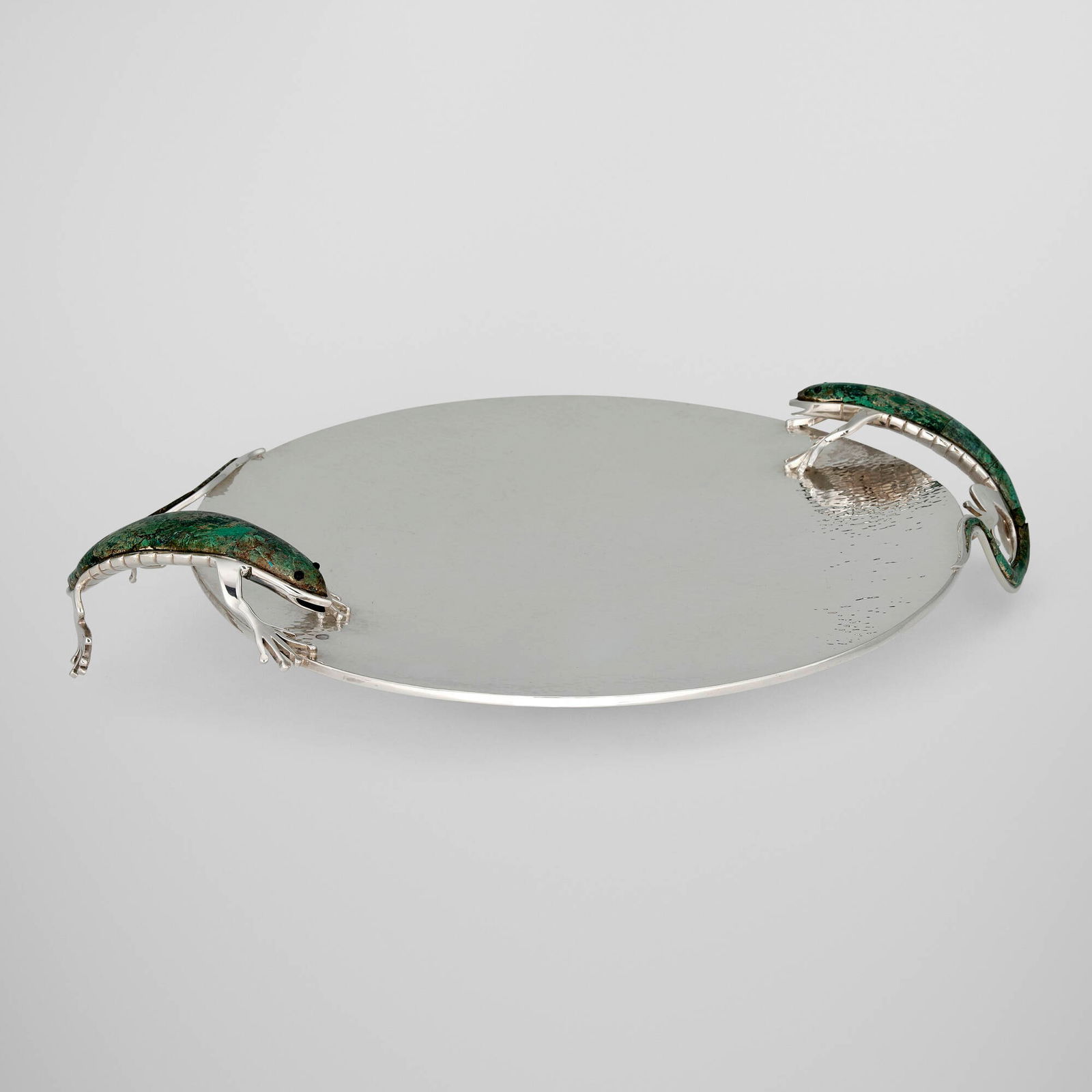 Emilia Castillo, Iguana tray: Emilia Castillo Iguana tray Mexico, c. 1990silver-plated metal, hardstone inlay 3.5 h x 20.5 w x 15.5 d in (9 x 52 x 39 cm) Incised signature to underside 'Emilia Castillo' and impressed 'Emil