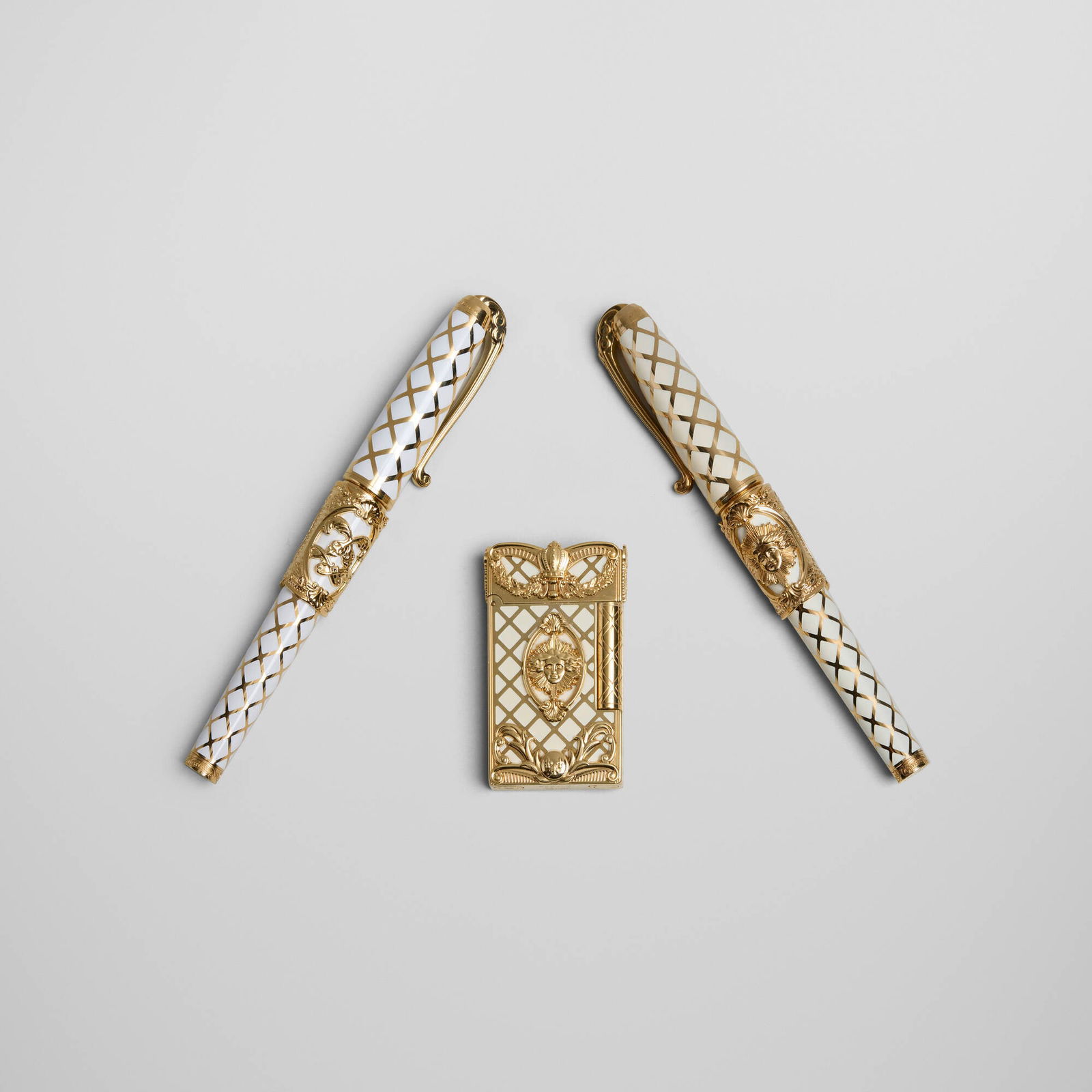 S.T. Dupont, Collection of three Versailles works: S.T. Dupont Collection of three Versailles works France, 2006lacquer, gilt metal pen: 5.75 h x 0.5 w x 0.75 d in (15 x 1 x 2 cm) lighter: 2.5 h x 1.5 w x 5 d in (6 x 4 x 13 cm) Collection i