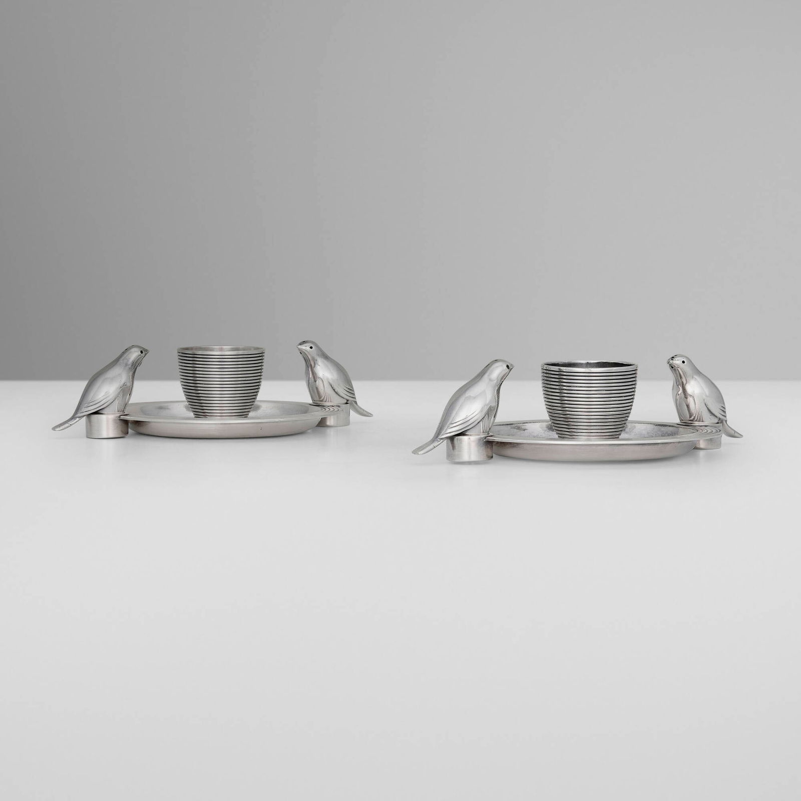 Christofle, Gallia egg cups with bird-form salt and pepper shakers, pair: Christofle Gallia egg cups with bird-form salt and pepper shakers, pair France, c. 1940silver-plated metal 2 h x 7 w x 4.75 d in (5 x 18 x 12 cm) Impressed manufacturer's mark and makers mark