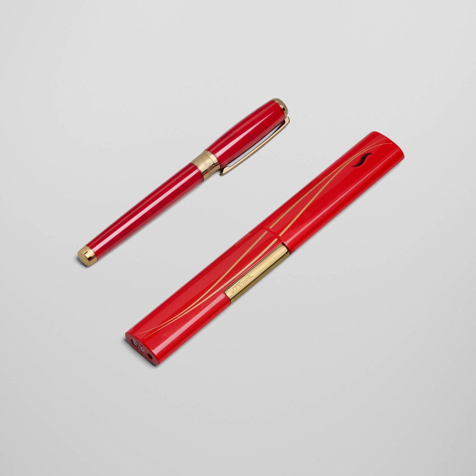 S.T. Dupont, The Wand candle lighter and Atelier ball pen: S.T. Dupont The Wand candle lighter and Atelier ball pen France, 2018 lacquer, gold-plated metal lighter: 7.25 h x 1 w x 0.5 d in (18 x 3 x 1 cm) pen: 5.75 h x 0.75 w x 0.625 d in (15 x 2 x 2 cm) 