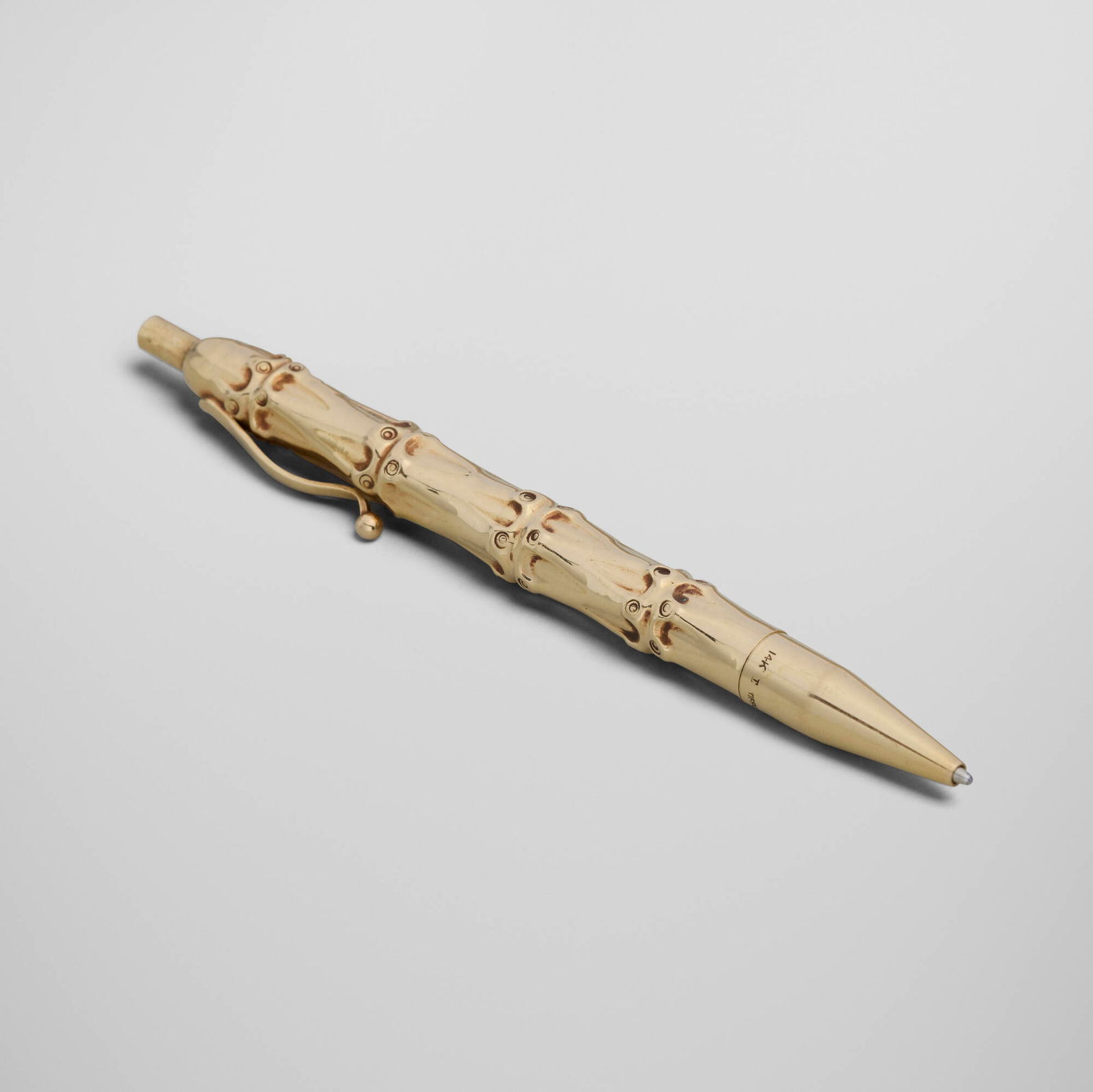 Louis Tamis for Tiffany & Co., Bamboo pen: Louis Tamis for Tiffany & Co. Bamboo pen USA, c. 1945 14k yellow gold 4.875 h x 0.5 w x 0.375 d in (12 x 1 x 1 cm) Impressed manufacturer's marks to side '14k T Tiffany & Co.'. 16.7 dwts. This