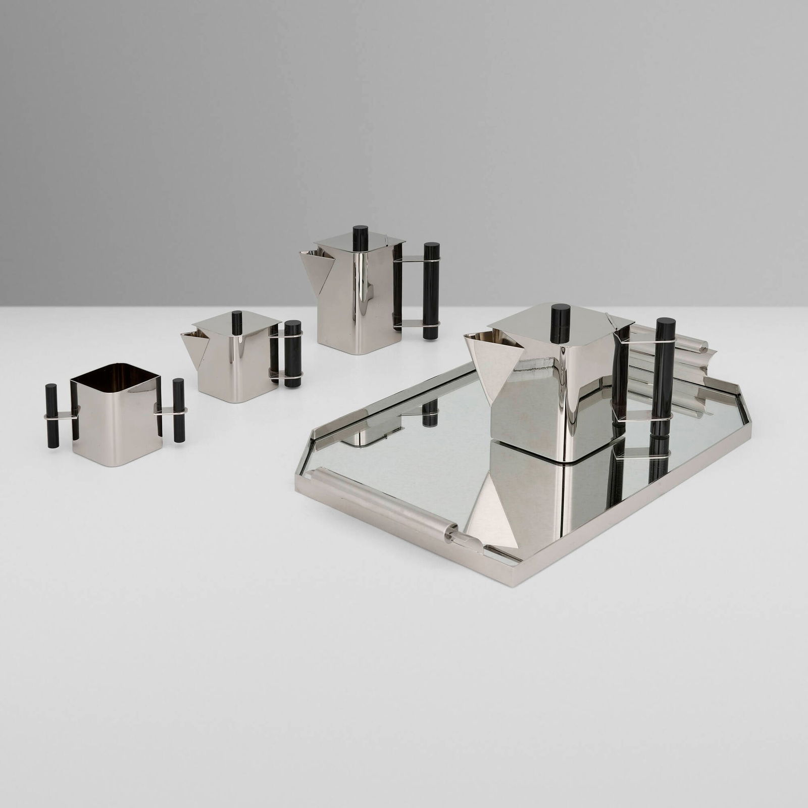 Massimo Podesta, Five-piece coffee and tea service: Massimo Podesta Five-piece coffee and tea service Montagnani L & C Firenze Italy, c. 1985 chrome-plated metal, acrylic largest: 2.25 h x 22 w x 13.5 d in (6 x 56 x 34 cm) smallest: 3.5 h x 5.5 w x