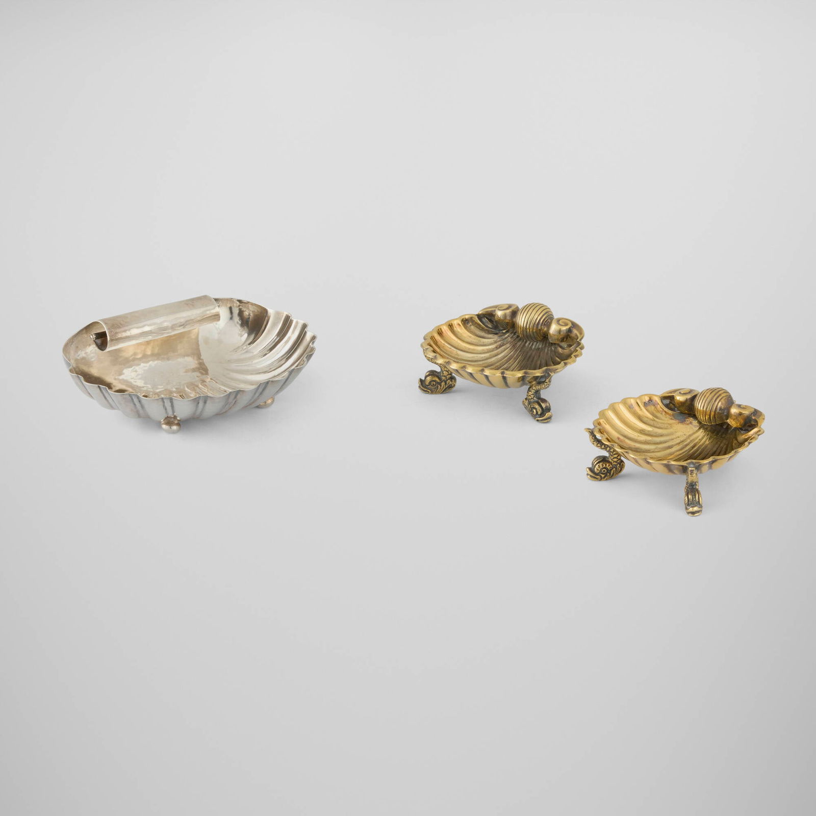 Tiffany & Co. and Buccellati, Collection of three shell-form tabletop accessories (1 of 3)