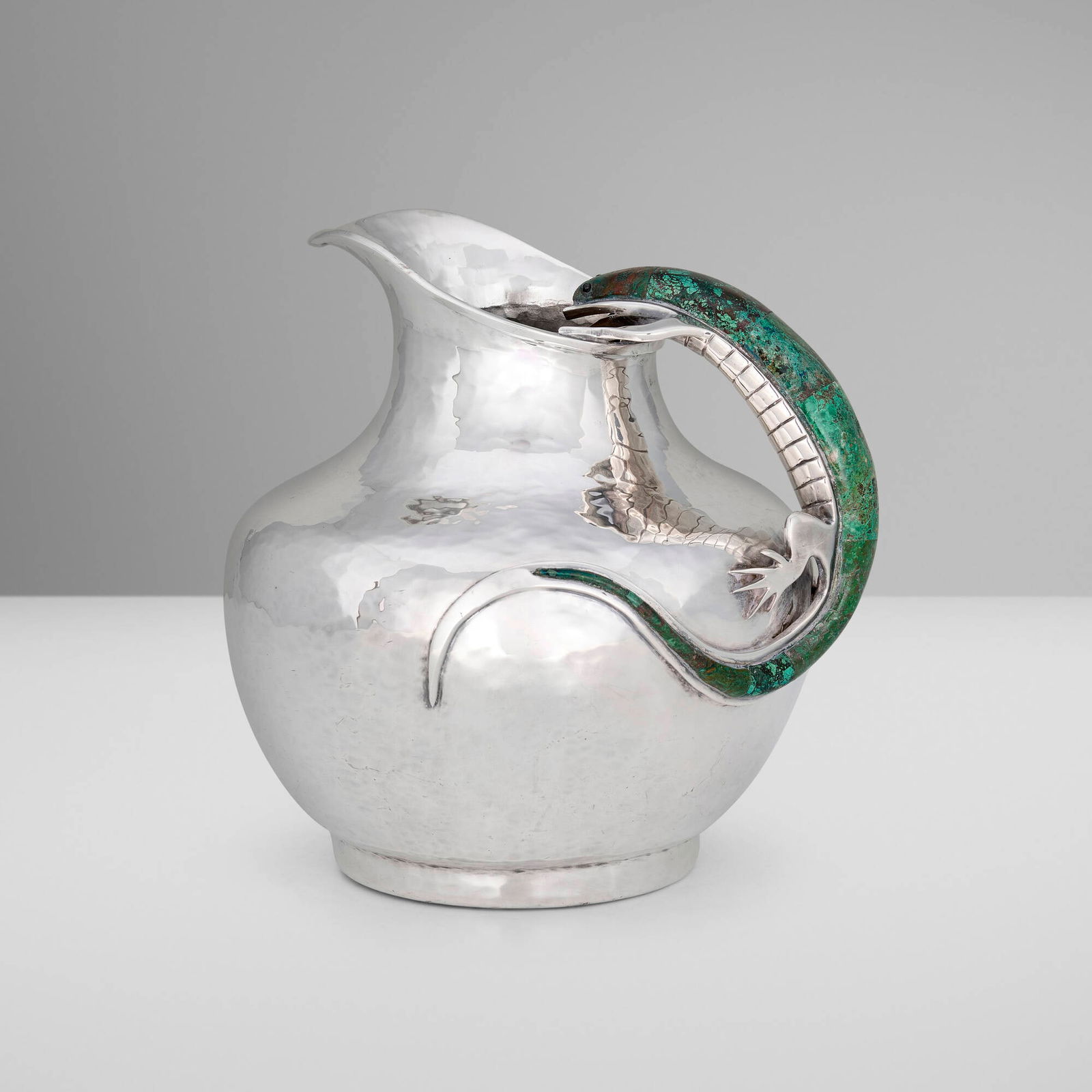 Emilia Castillo, Iguana jug: Emilia Castillo Iguana jug Mexico, c. 2000silver-plated metal, hardstone inlay 8.5 h x 8.5 w x 8 d in (22 x 22 x 20 cm) Impressed manufacturer's mark to underside 'Emilia Castillo 13 Mexico Pl