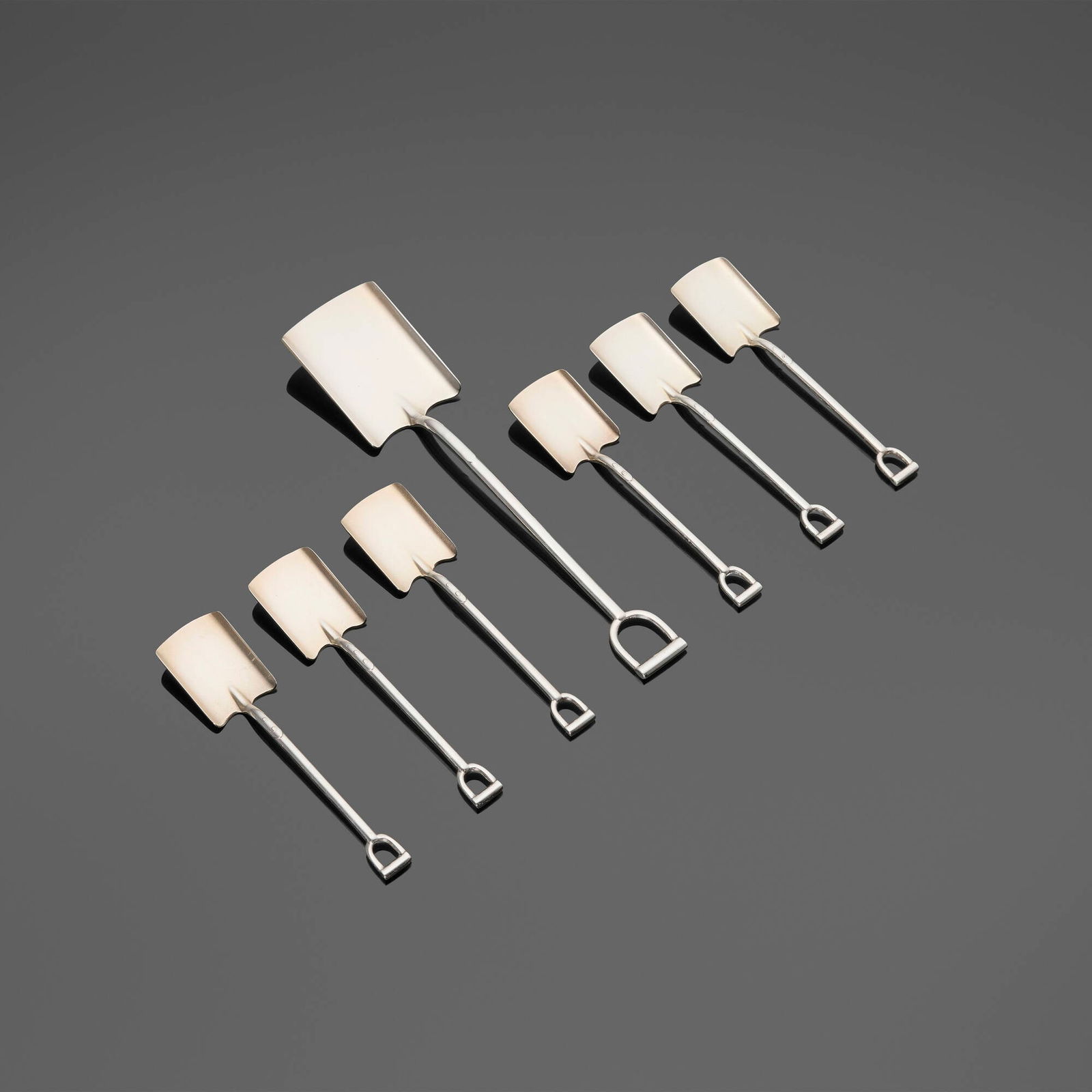 Wurttembergische Metallwarenfabrik (WMF), Shovel-form dessert service: Wurttembergische Metallwarenfabrik (WMF) Shovel-form dessert service Germany, c. 1930 silver-plated metal parcel-gilt 7.5 h x 1.75 w x 0.5 d in (19 x 4 x 1 cm) 4.5 h x 1.25 w x 0.25 d in (11 x 3 x