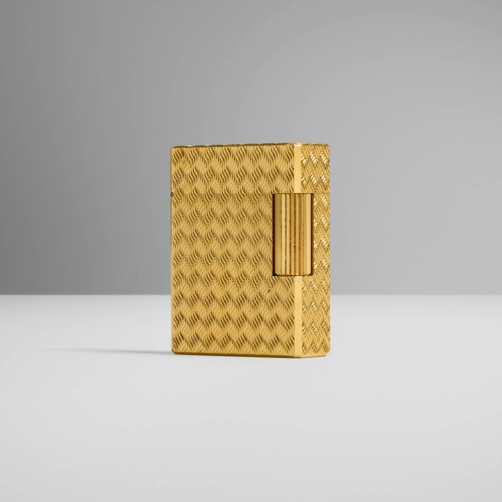 Hermes, Pocket lighter: Hermes Pocket lighter S.T. DupontFrance, c. 1965gold-plated metal 1.75 h x 1.25 w x 0.5 d in (4 x 3 x 1 cm) Impressed manufacturer's mark to underside 'S.T. Dupont Hermes Paris Plaque 20