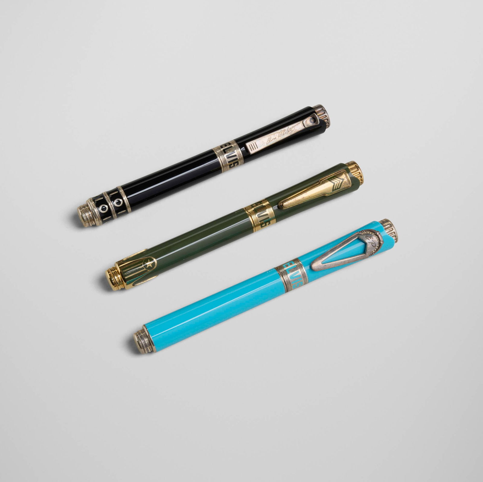 Montegrappa, Icons Tribute to Elvis Presley rollerball pens, set of three: Montegrappa Icons Tribute to Elvis Presley rollerball pens, set of three Italy, 2013 resin, gold-plated sterling silver, sterling silver 5.5 h x 0.75 w x 0.5 d in (14 x 2 x 1 cm) Impressed
