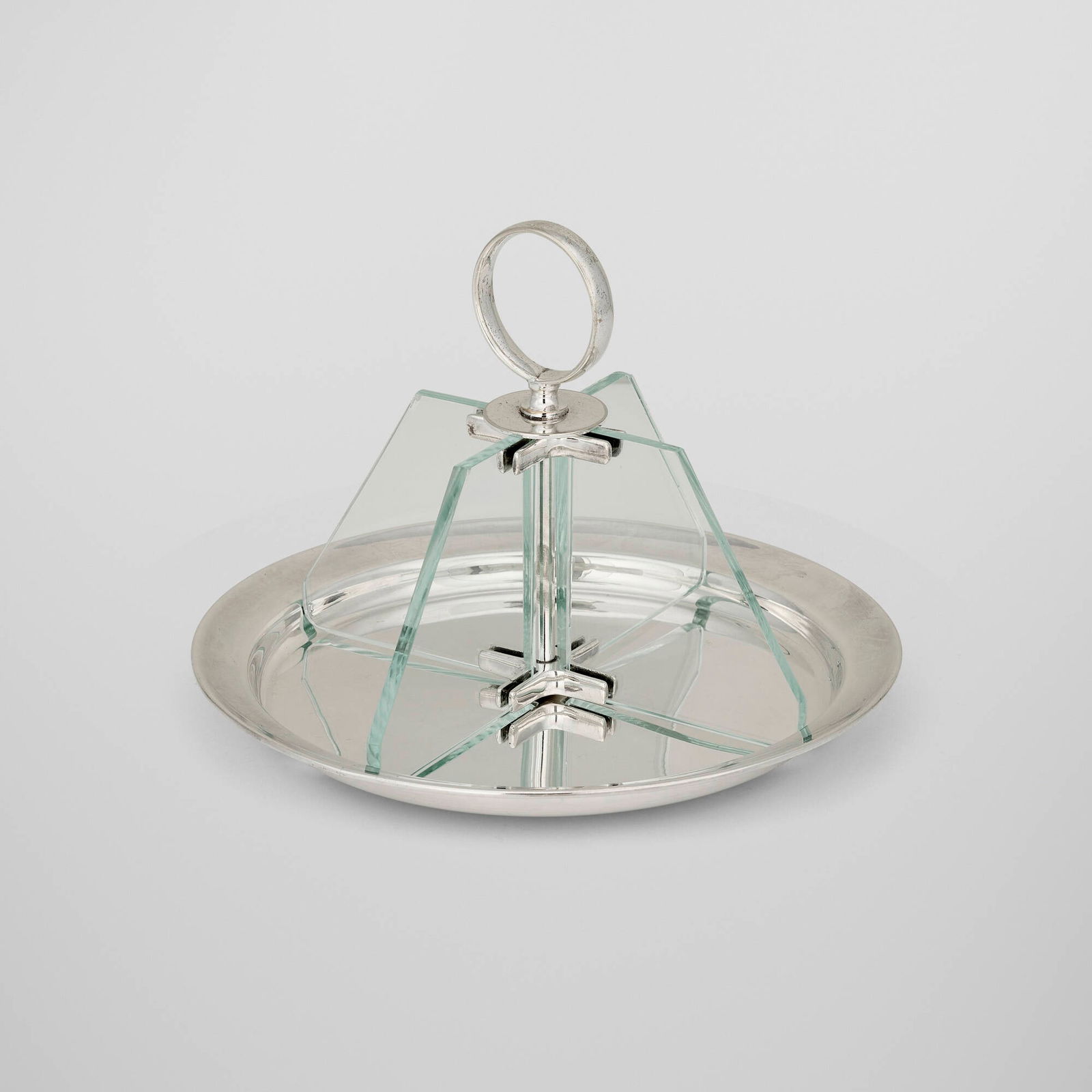 Raeno Silver Plate Co. Ltd., Dish with divider: Raeno Silver Plate Co. Ltd. Dish with divider Birmingham, United Kingdom, c. 1930 electroplated nickel silver, glass 7 h x 9 dia in (18 x 23 cm) Impressed maker's mark to underside 'EPNS Raeno'. 