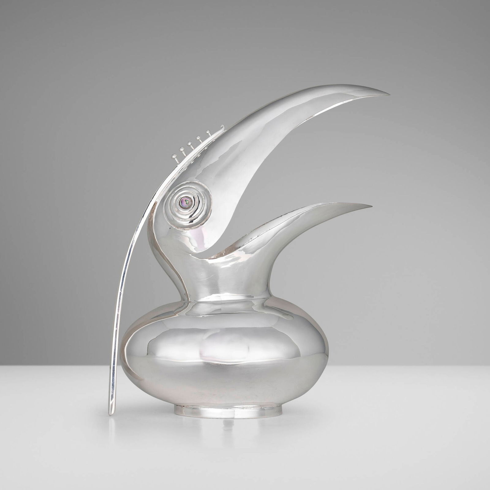 Jorge "Chato" Castillo, Jarra Tucan: Jorge "Chato" Castillo Jarra Tucan Mexico, c. 1955silver-plated metal, mother-of-pearl 11.75 h x 10 w x 5 d in (30 x 25 x 13 cm) Impressed manufacturer's mark to underside 'Chato Castillo Taxc