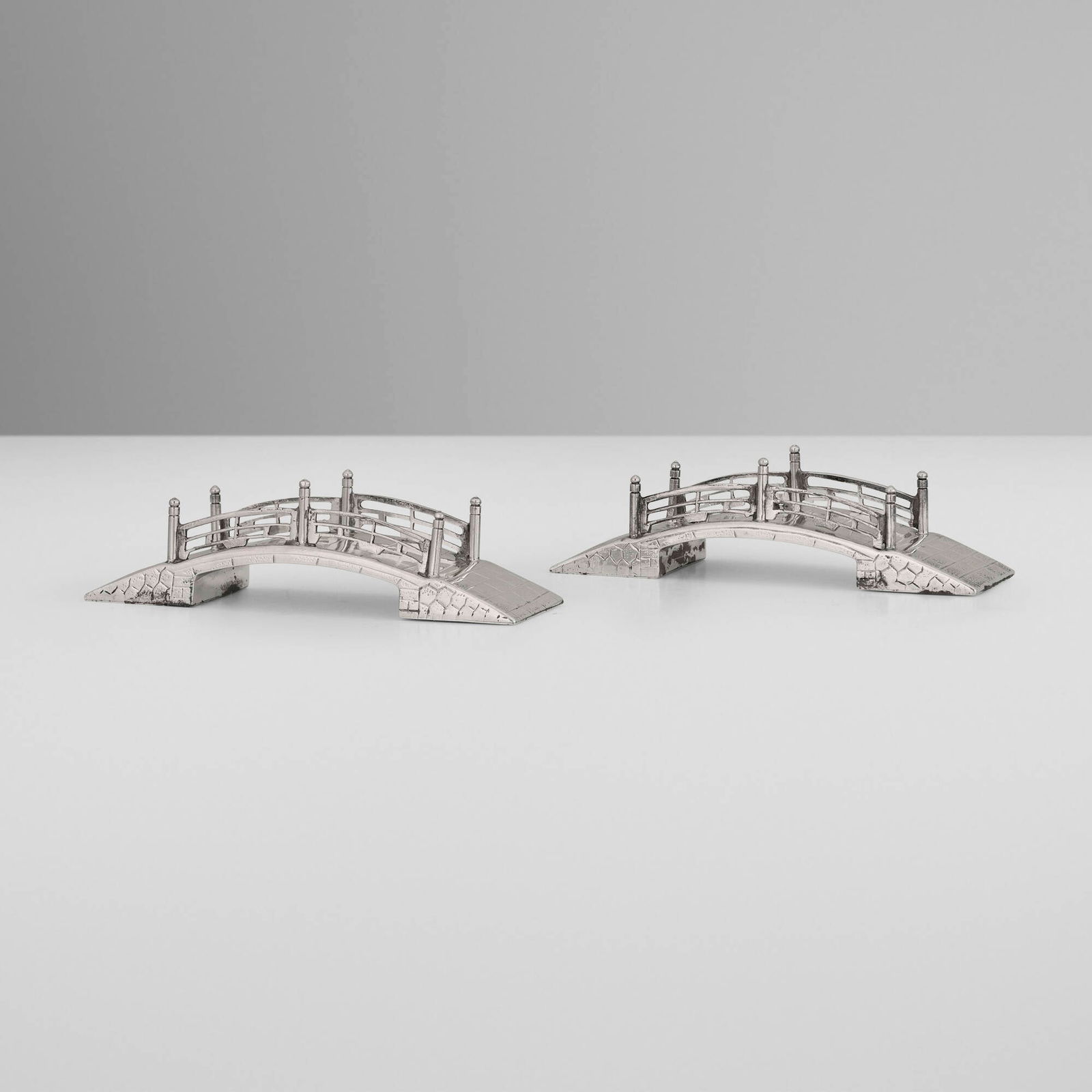 Japanese, Garden bridge salt and pepper shakers, pair: Japanese Garden bridge salt and pepper shakers, pair 20th century sterling silver 0.75 h x 3.25 w x 1 d in (2 x 8 x 3 cm) Impressed mark to underside of each example 'Sterling'. 1.646 ozt. (gross