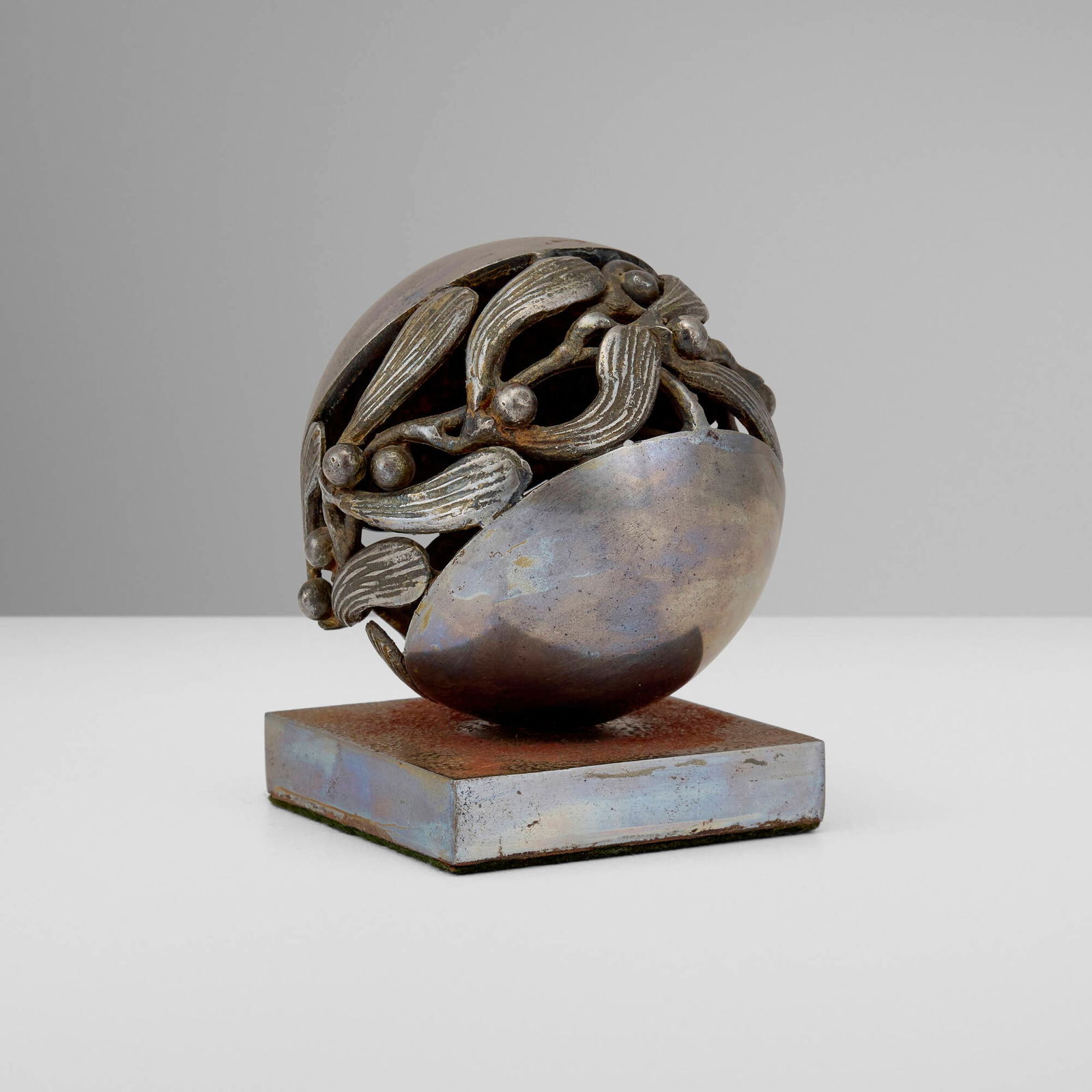 Edgar Brandt, Boule de Gui paperweight: Edgar Brandt Boule de Gui paperweight France, c. 1925 steel 4 h x 3 w x 3 d in (10 x 8 x 8 cm) Impressed signature to base 'Edgar Brandt'. Literature: Edgar Brandt: Master of Art Deco Ironwork,