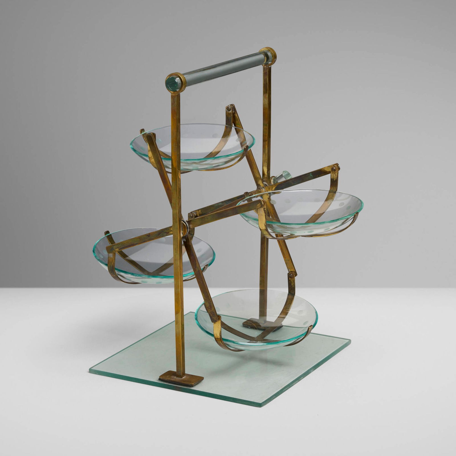 European, Condiment carousel: European Condiment carousel c. 1960 glass, brass 14.75 h x 10 w x 14.5 d in (37 x 25 x 37 cm) Provenance: Private European Collection This work will ship from Chicago, Illinois.