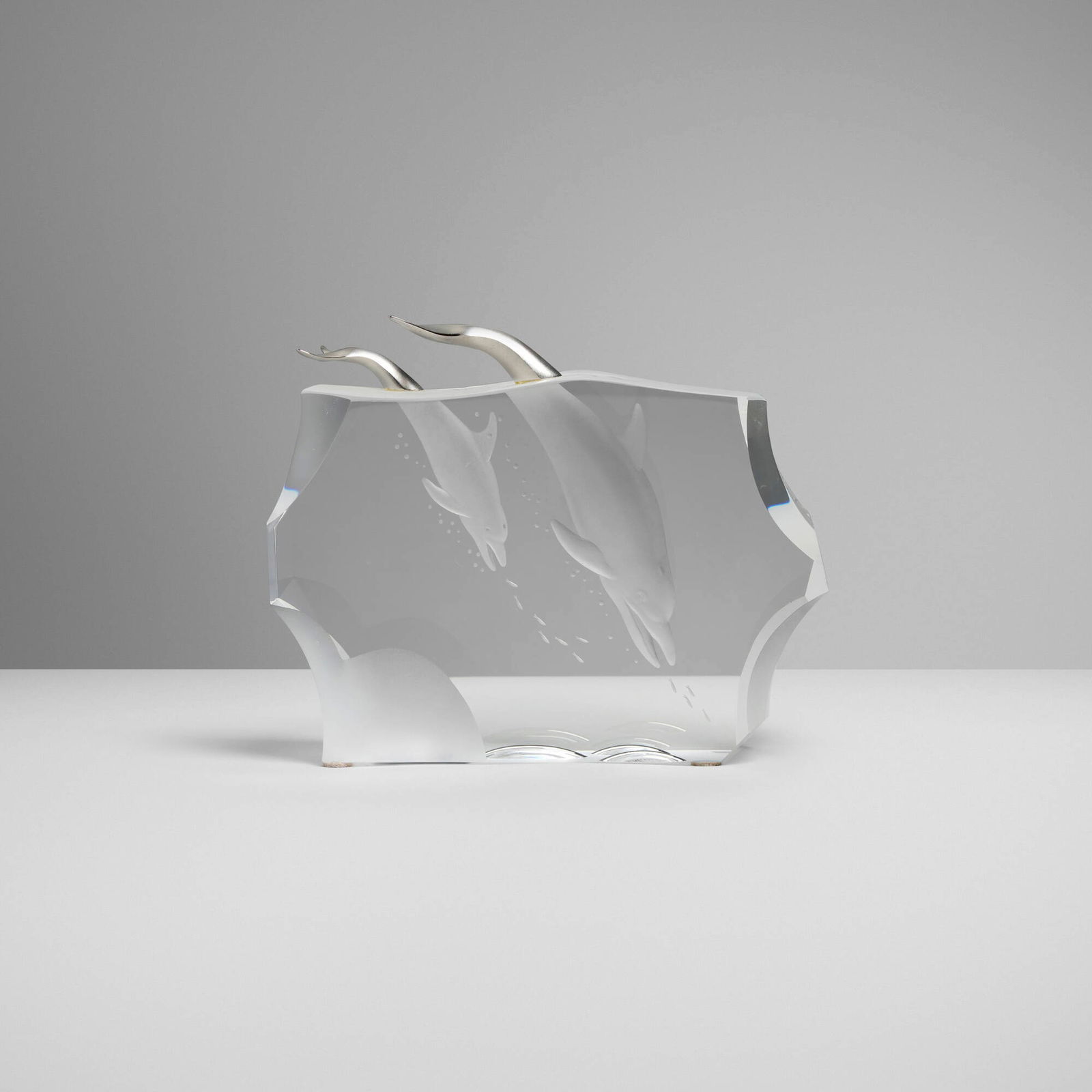 James Houston for Steuben, Dolphins (Rare sculpture): James Houston for Steuben Dolphins (Rare sculpture) USA, 1989lead glass, rhodium-plated sterling silver 6 h x 7.25 w x 2.25 d in (15 x 18 x 6 cm) Incised manufacturer's mark and number to unde