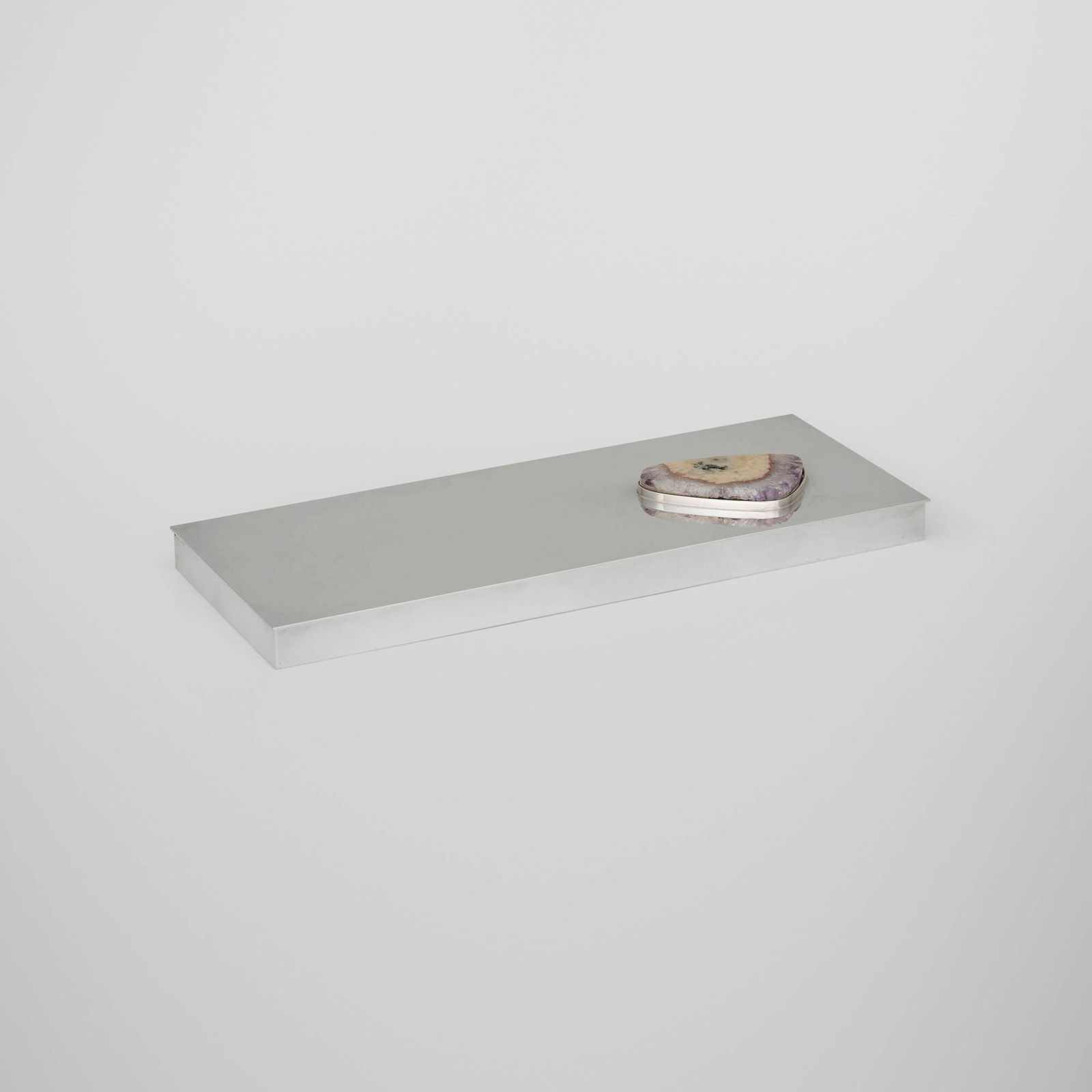 In the manner of Maria Pergay, Cigarette box: In the manner of Maria Pergay Cigarette box France, c. 1974silver-plated brass, amethyst, cedar lining 1 h x 9.875 w x 4 d in (3 x 25 x 10 cm) Impressed number to interior '2' with several eng