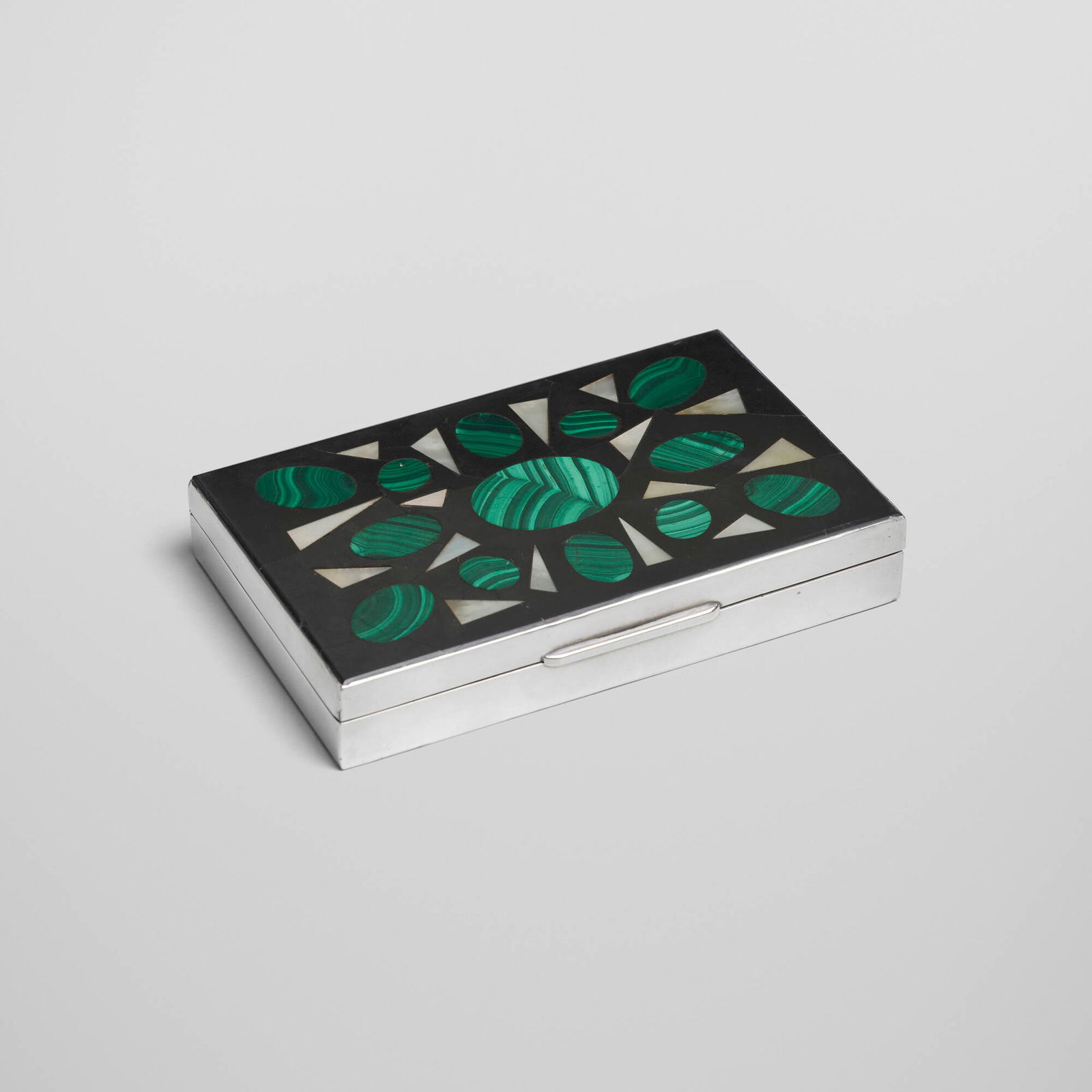 Richard Blow, Cigar box: Richard Blow Cigar box Montici USA / Italy, c. 1965 hand-cut malachite and mother-of-pearl inlay, .800 silver, cedar lining 1.125 h x 6.25 w x 4.125 d in (3 x 16 x 10 cm) Inlaid cipher to