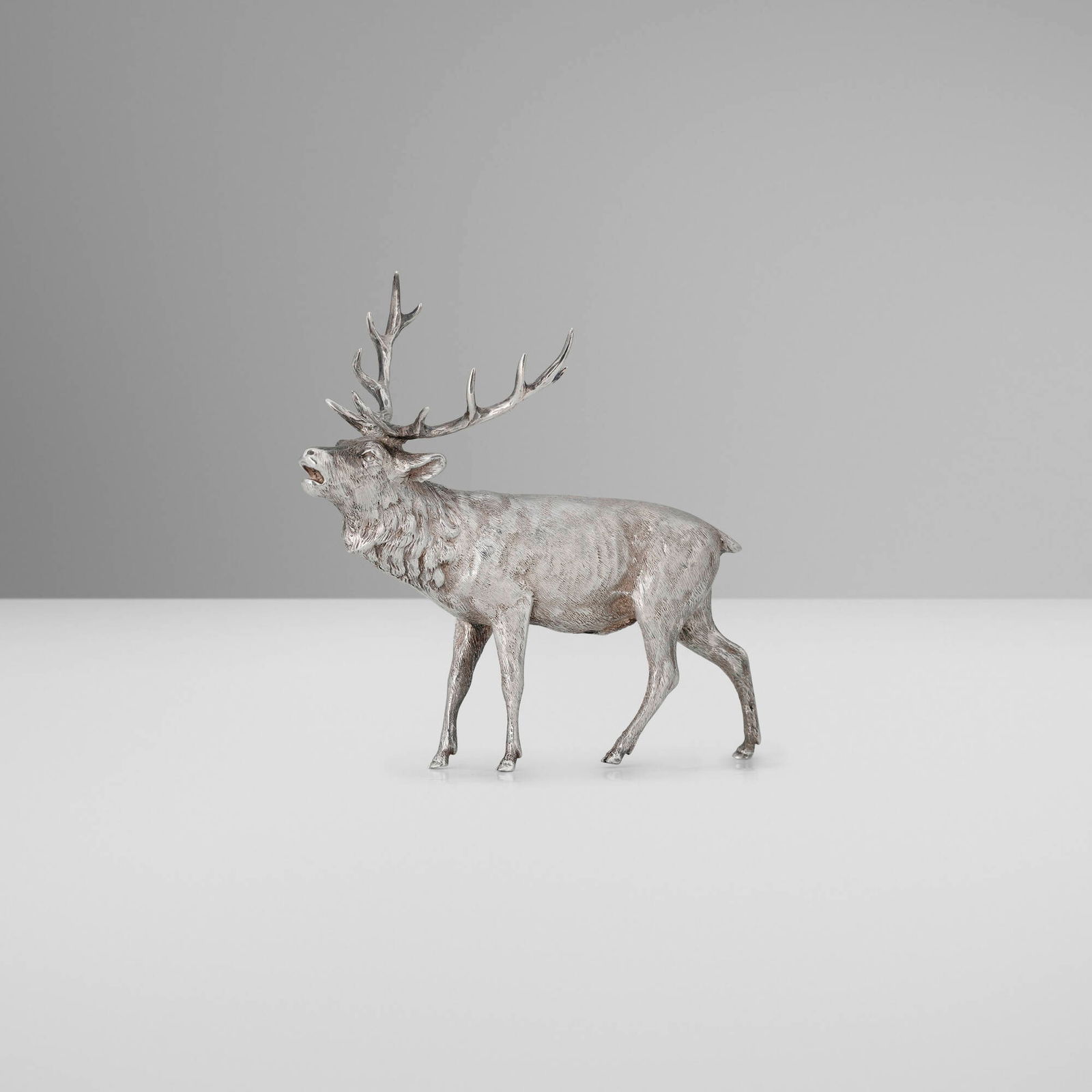 Asprey & Garrard Limited, Elizabeth II Millennium bugling stag figurine: Asprey & Garrard Limited Elizabeth II Millennium bugling stag figurine United Kingdom, 1999-2000 sterling silver 4 h x 4 w x 2 d in (10 x 10 x 5 cm) Impressed maker's mark and English hallmarks to