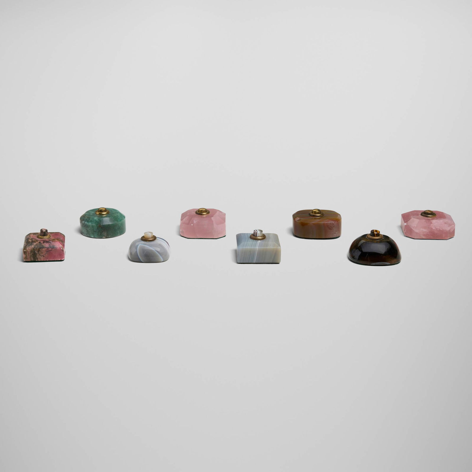 20th Century, Collection of eight bell pushes: 20th Century Collection of eight bell pushes rose quartz, obsidian, rhodonite, tiger's eye, agate, aventurine, brass largest: 1.25 h x 2.25 w x 2.25 d in (3 x 6 x 6 cm) smallest: 1.25 h x 2 w x 2 d