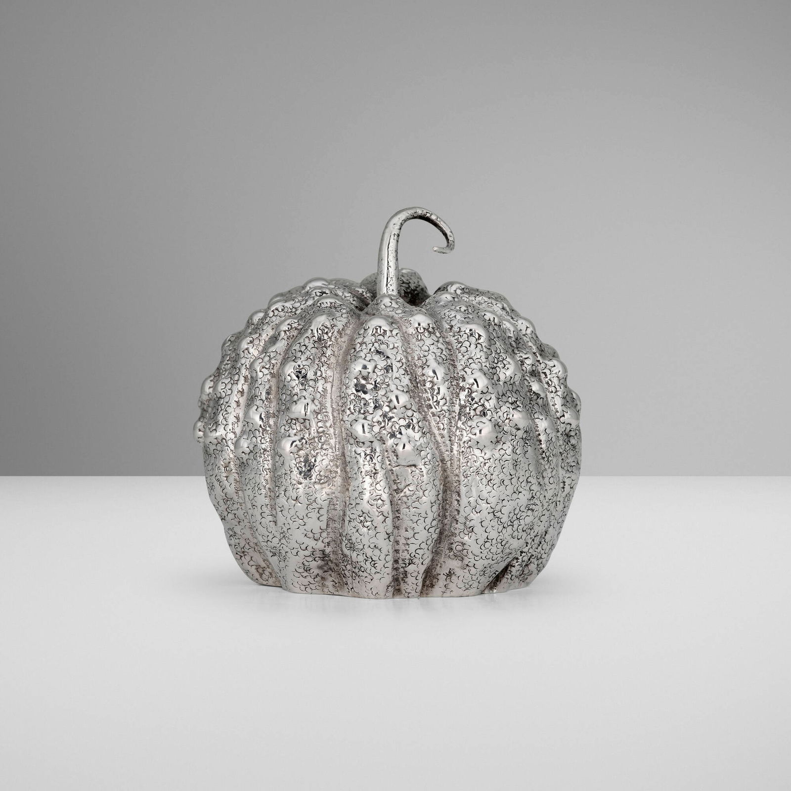 Buccellati, Pumpkin lighter: Buccellati Pumpkin lighter Italy, c. 1975.800 silver 3.625 h x 3.125 dia in (9 x 8 cm) Incised manufacturer's mark to underside 'Buccellati Italy 51224 800'. 4.919 ozt. (gross weight). <