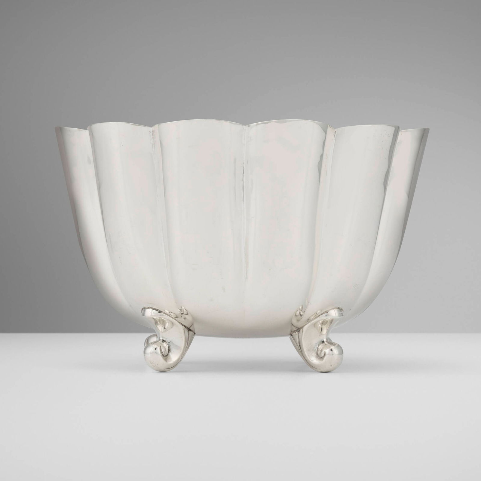 Cartier, Fluted footed bowl: Cartier Fluted footed bowl France, mid-20th century sterling silver 5.25 h x 8.25 dia in (13 x 21 cm) Impressed manufacturer's mark to underside with hallmarks 'Cartier 1171 Hand Fluted'. 29.9