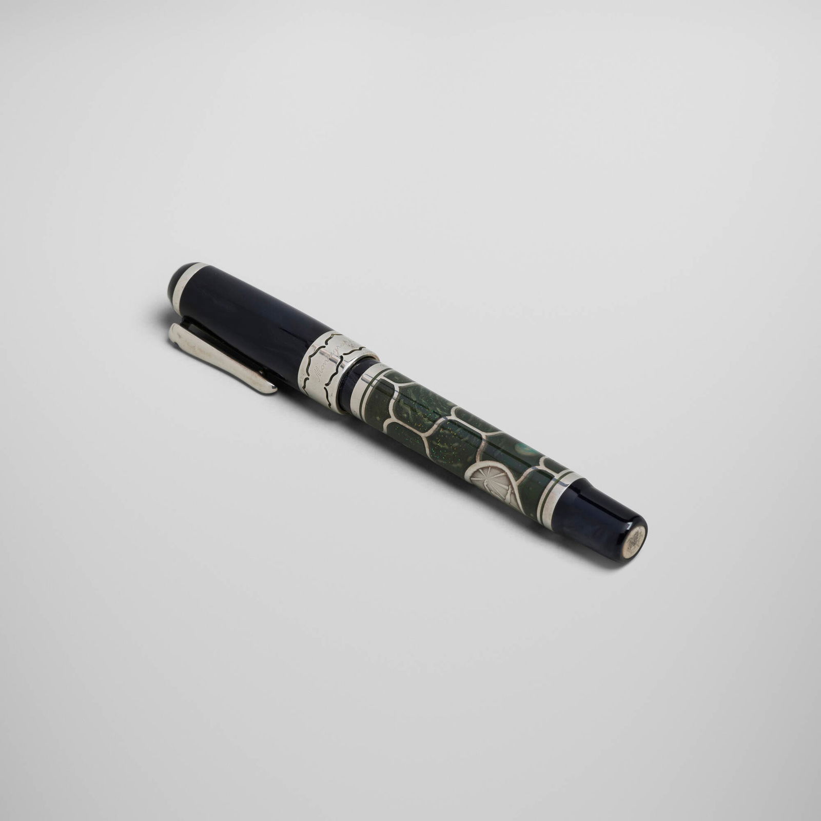 Montegrappa, Cosmos Enigma rollerball pen: Montegrappa Cosmos Enigma rollerball pen Italy, 2002 enamel, sterling silver, sapphire, wood, acrylic pen: 5.625 h x 0.875 w x 0.625 d in (14 x 2 x 2 cm) presentation case: 10.25 h x 5.5 dia in (26