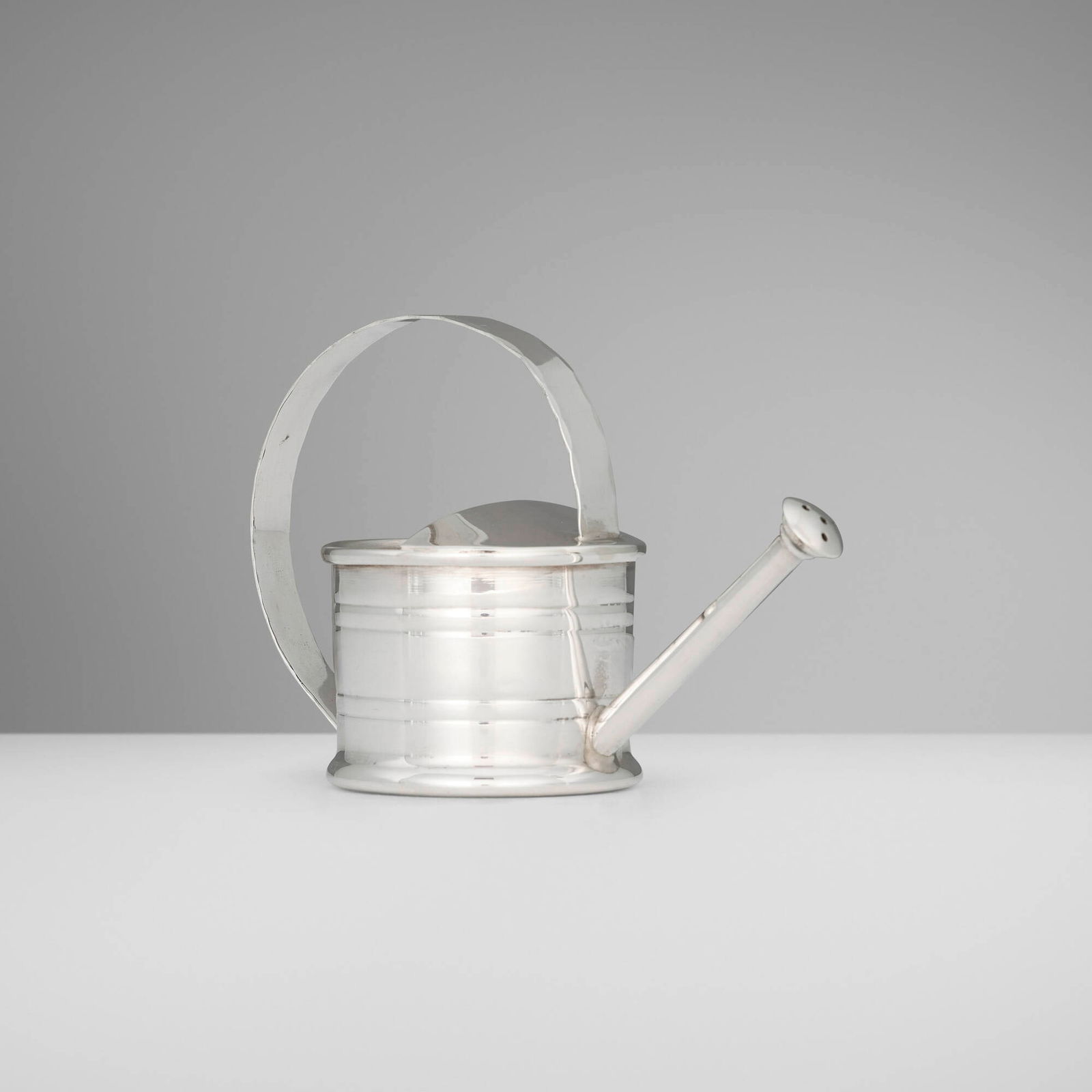 Cartier, Watering can-form vermouth dropper: Cartier Watering can-form vermouth dropper France, c. 1960 sterling silver 3.25 h x 4.25 w x 2.25 d in (8 x 11 x 6 cm) Impressed manufacturer's mark to underside 'Cartier Sterling'. 1.66 ozt. 