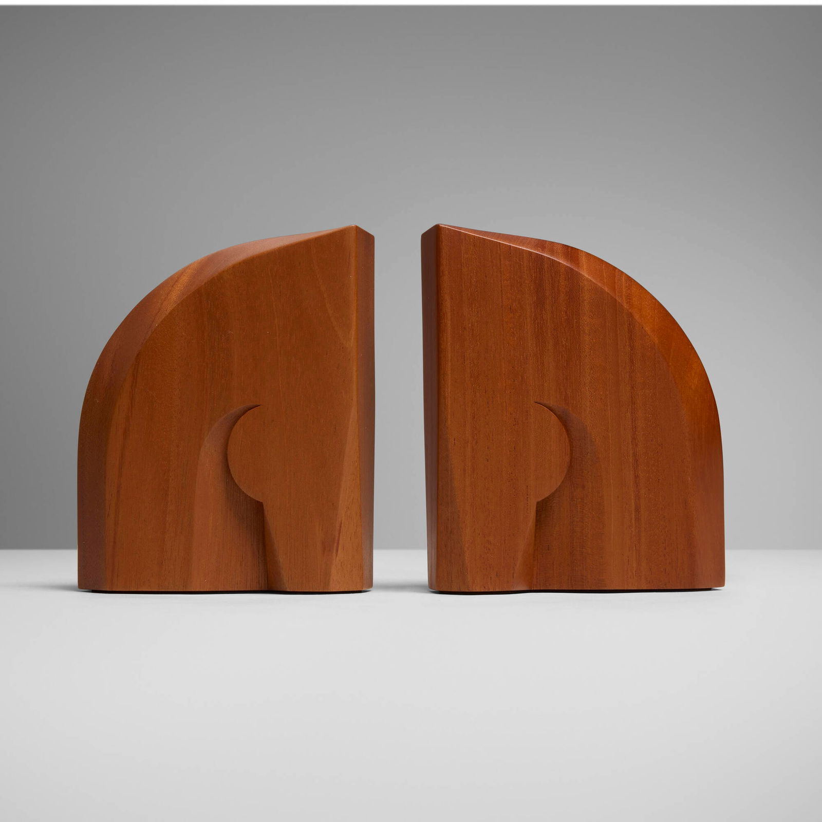 Hermes, Alezan bookends, pair: Hermes Alezan bookends, pair France / Indonesia, c. 2020 mahogany 6 h x 5 w x 1.75 d in (15 x 13 x 4 cm) Impressed manufacturer's mark to underside and side of each example 'Hermes Paris Made in
