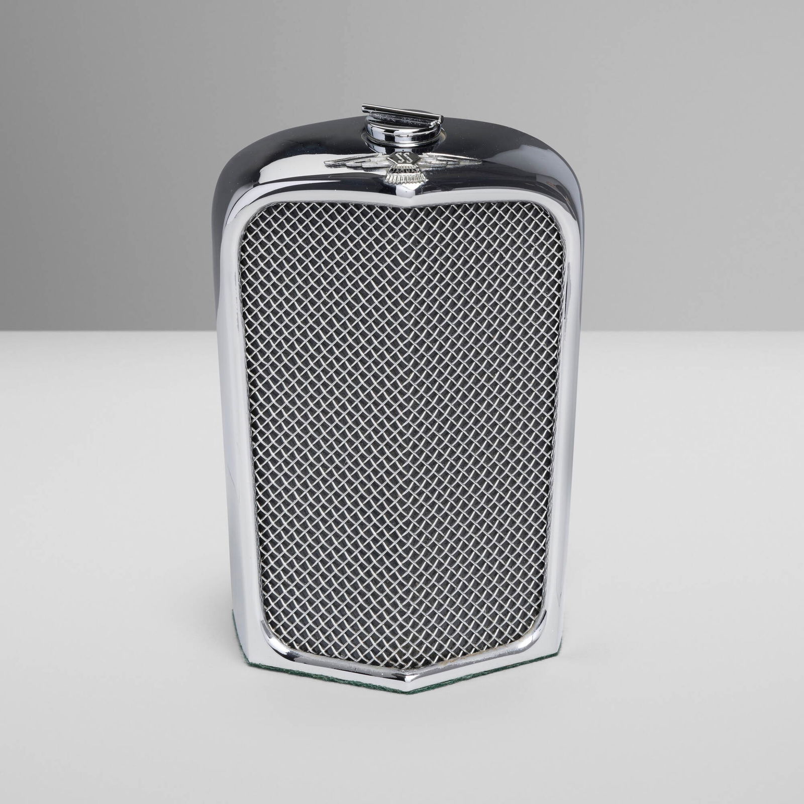 Ruddspeed Ltd., SS Jaguar radiator decanter: Ruddspeed Ltd. SS Jaguar radiator decanter United Kingdom, c. 1965 chrome-plated metal, glass liner 7 h x 4.75 w x 2.25 d in (18 x 12 x 6 cm) Impressed manufacturer's mark to reverse 'Ruddspeed