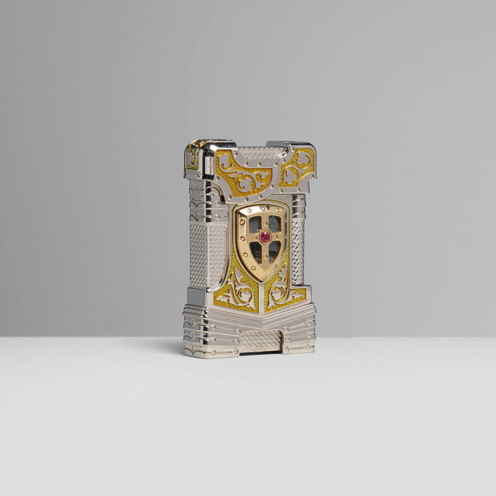 S.T. Dupont, White Knight Prestige pocket lighter: S.T. Dupont White Knight Prestige pocket lighter France, 2014 palladium-plated metal parcel-gilt, jasper, ruby 2.5 h x 1.625 w x 0.5 d in (6 x 4 x 1 cm) Impressed manufacturer's mark and number