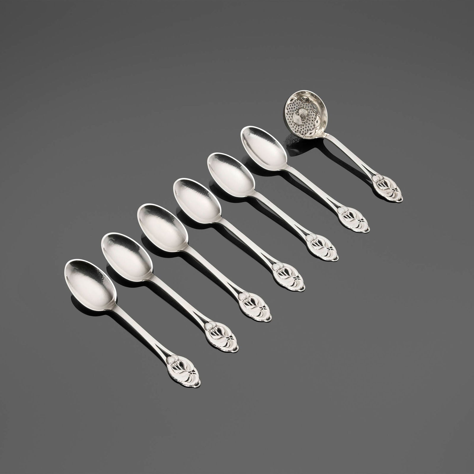 Evald Nielsen, Strawberry service: Evald Nielsen Strawberry service Denmark, c. 1930.830 silver 1 h x 7 w x 2.25 d in (3 x 18 x 6 cm) 0.5 h x 7 w x 1.5 d in (1 x 18 x 4 cm) Service is comprised of a set of six spoons and a s